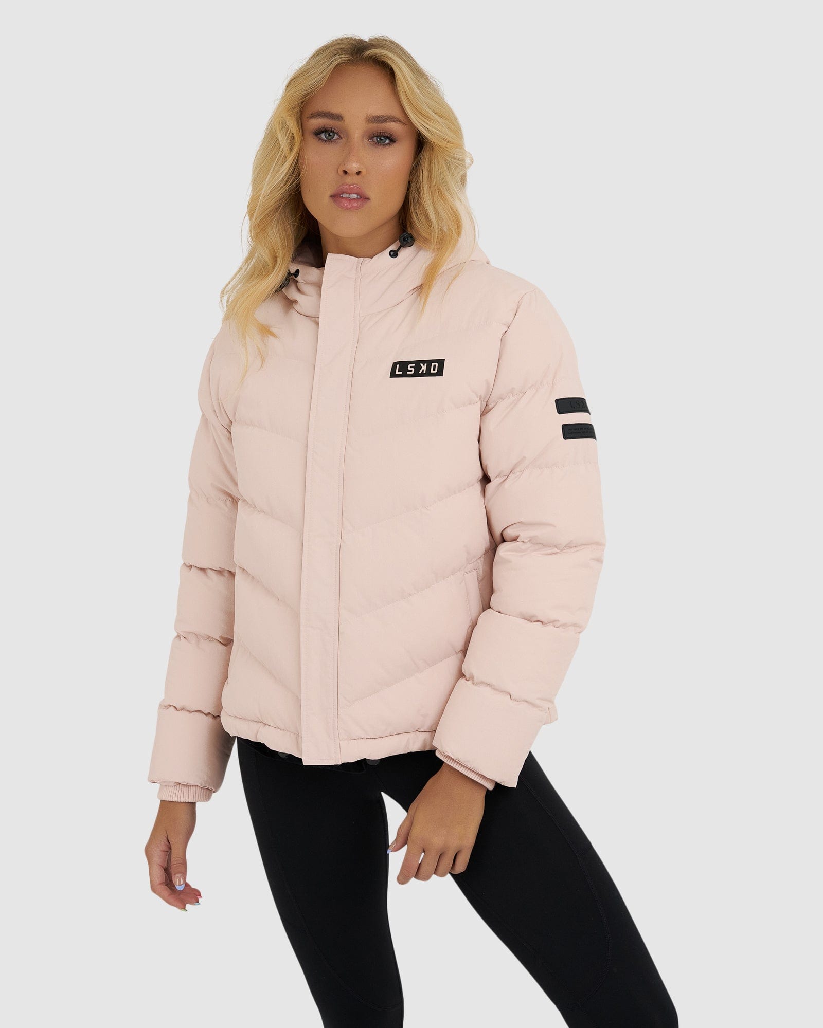 Model wearing Roasted Puffer Jacket 21 - Peach Whip