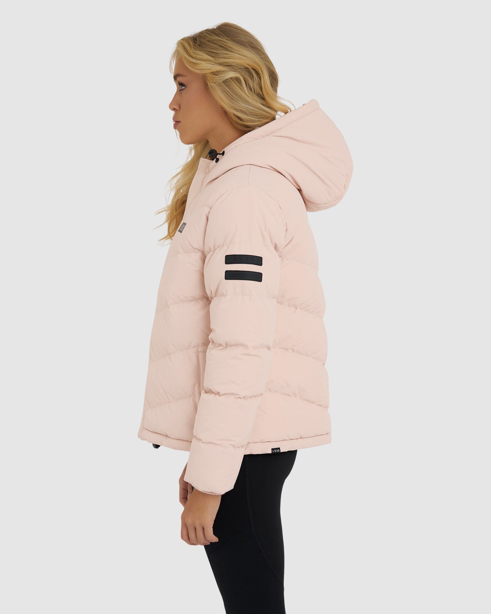 Model wearing Roasted Puffer Jacket 21 - Peach Whip
