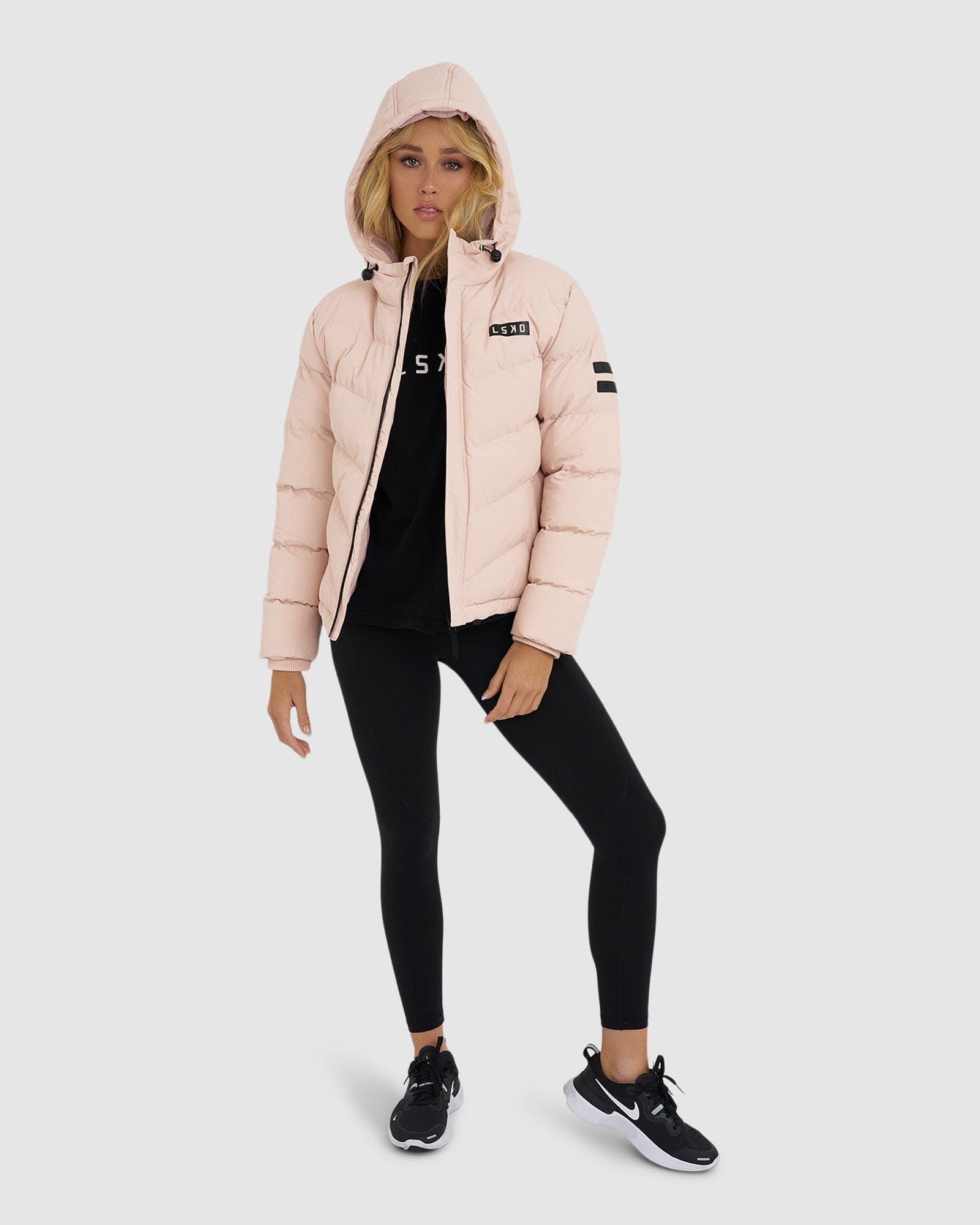 Model wearing Roasted Puffer Jacket 21 - Peach Whip