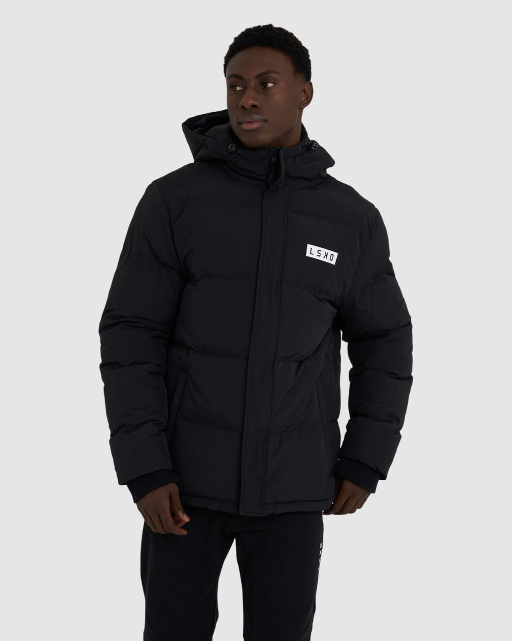 Model wearing Roasted Puffer Jacket Oversize 21  - Black