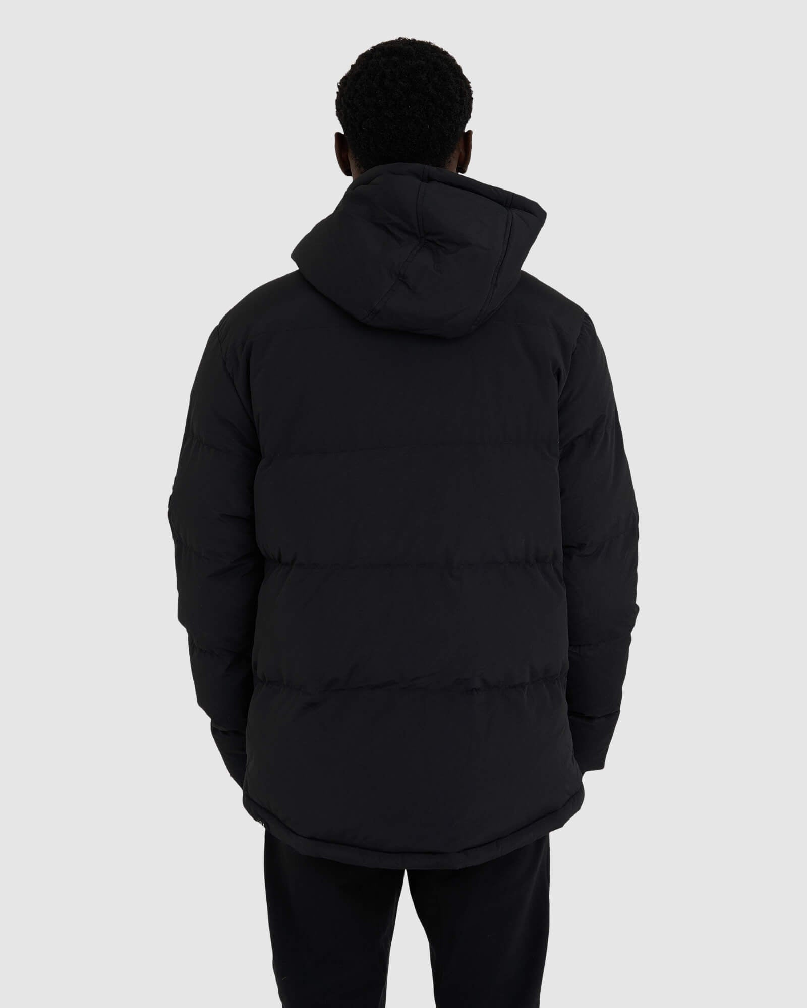 Model wearing Roasted Puffer Jacket Oversize 21  - Black