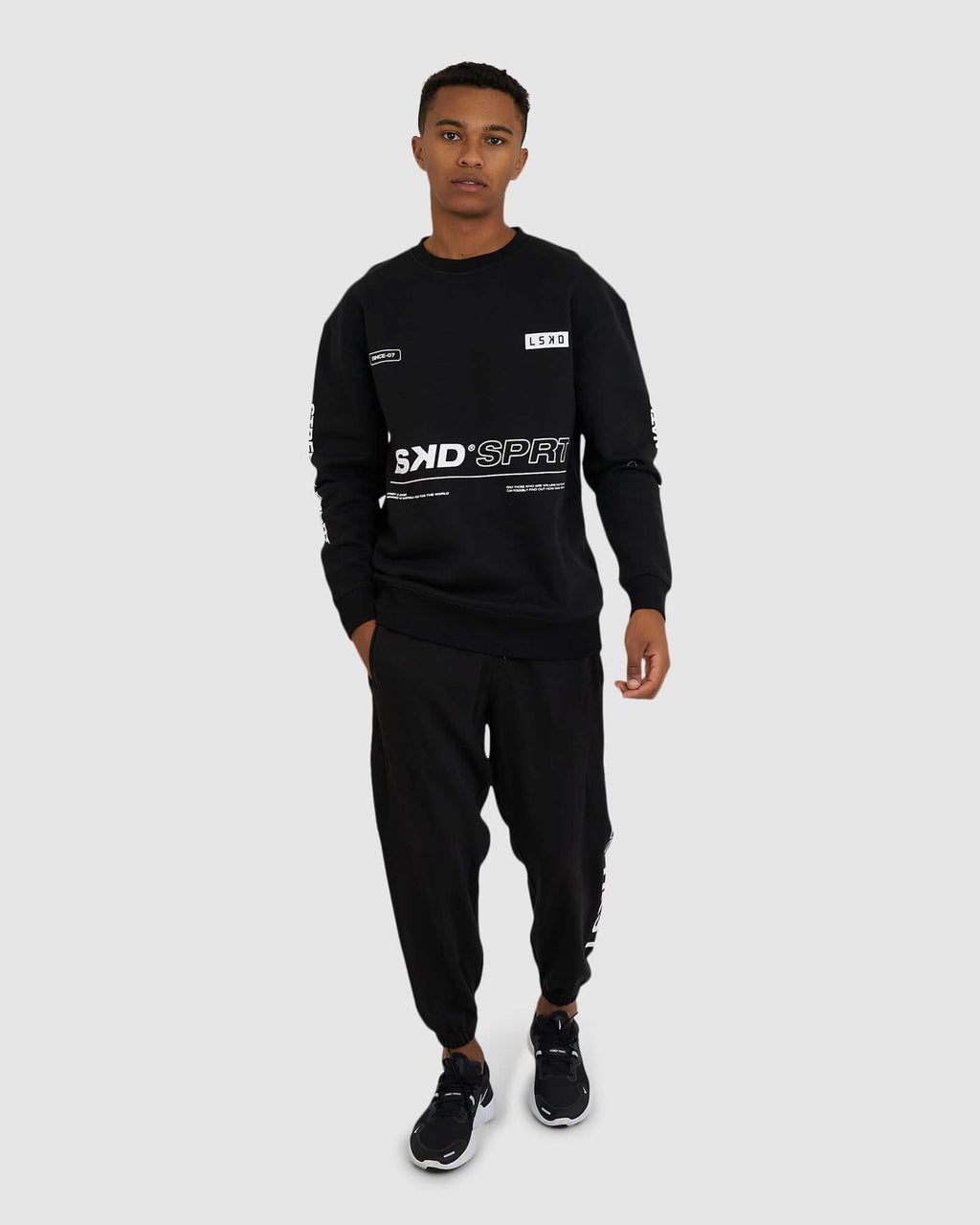 Model wearing SPRT Trackpant - Black