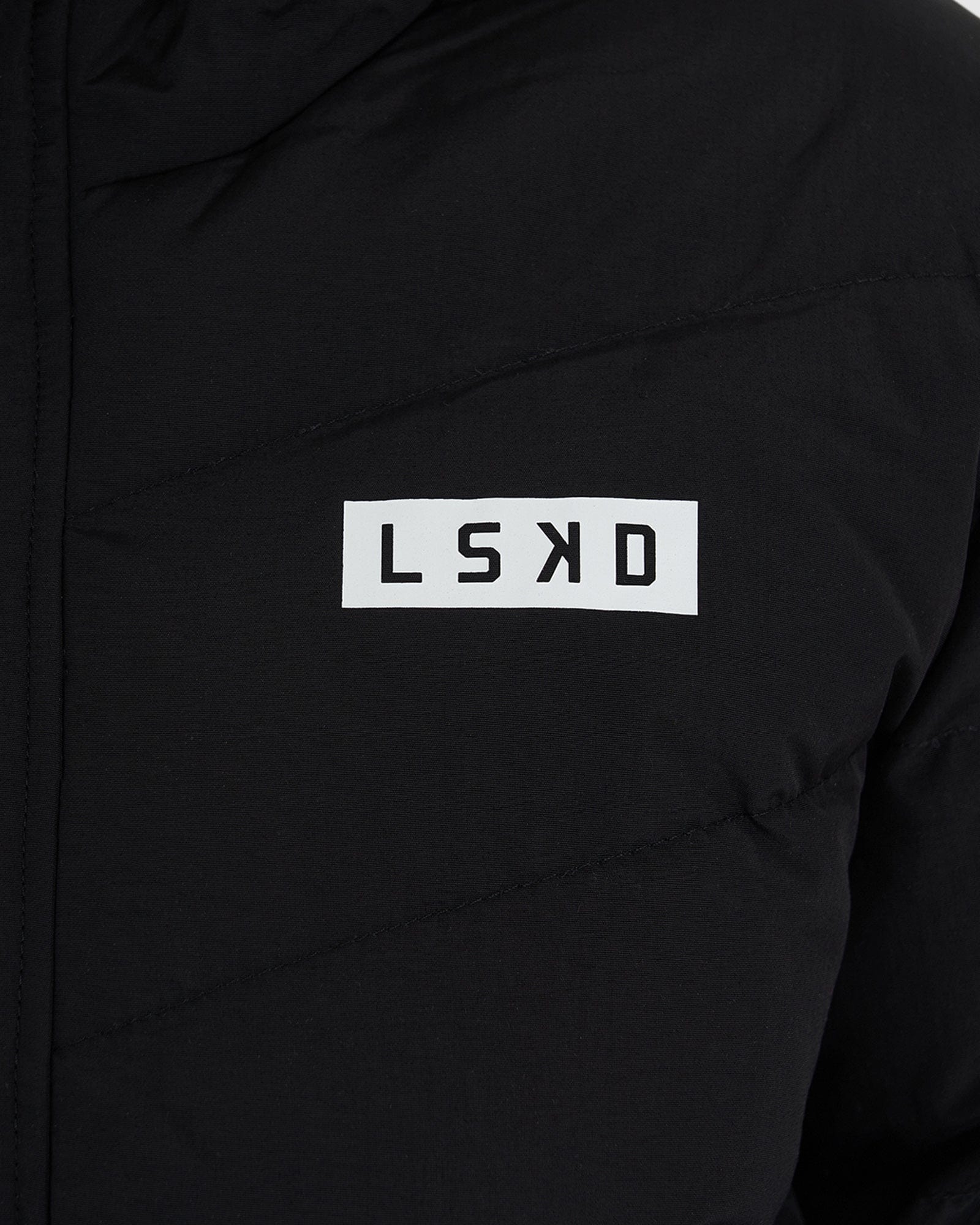 Model wearing Roasted Puffer Jacket 21 - Black