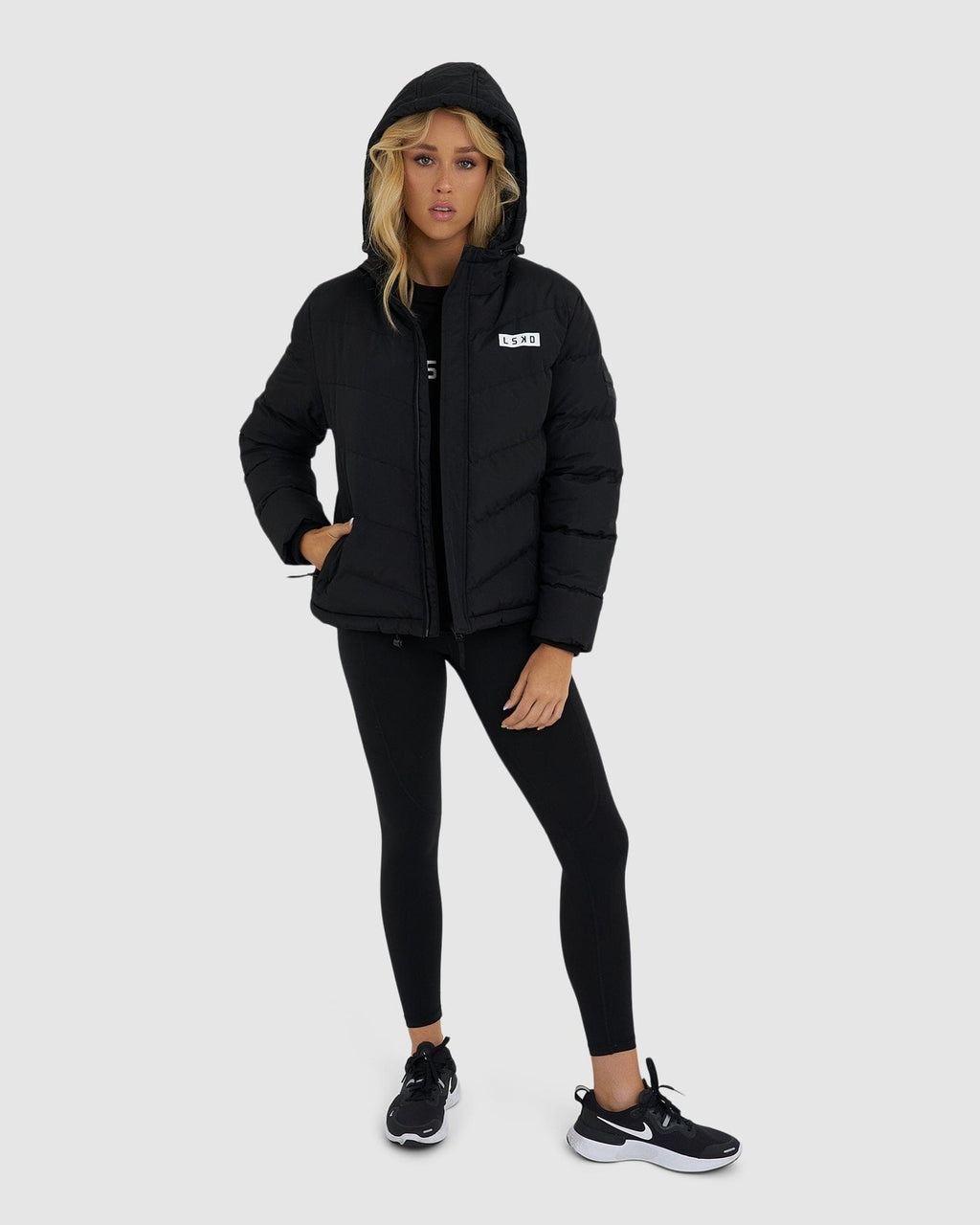 Model wearing Roasted Puffer Jacket 21 - Black
