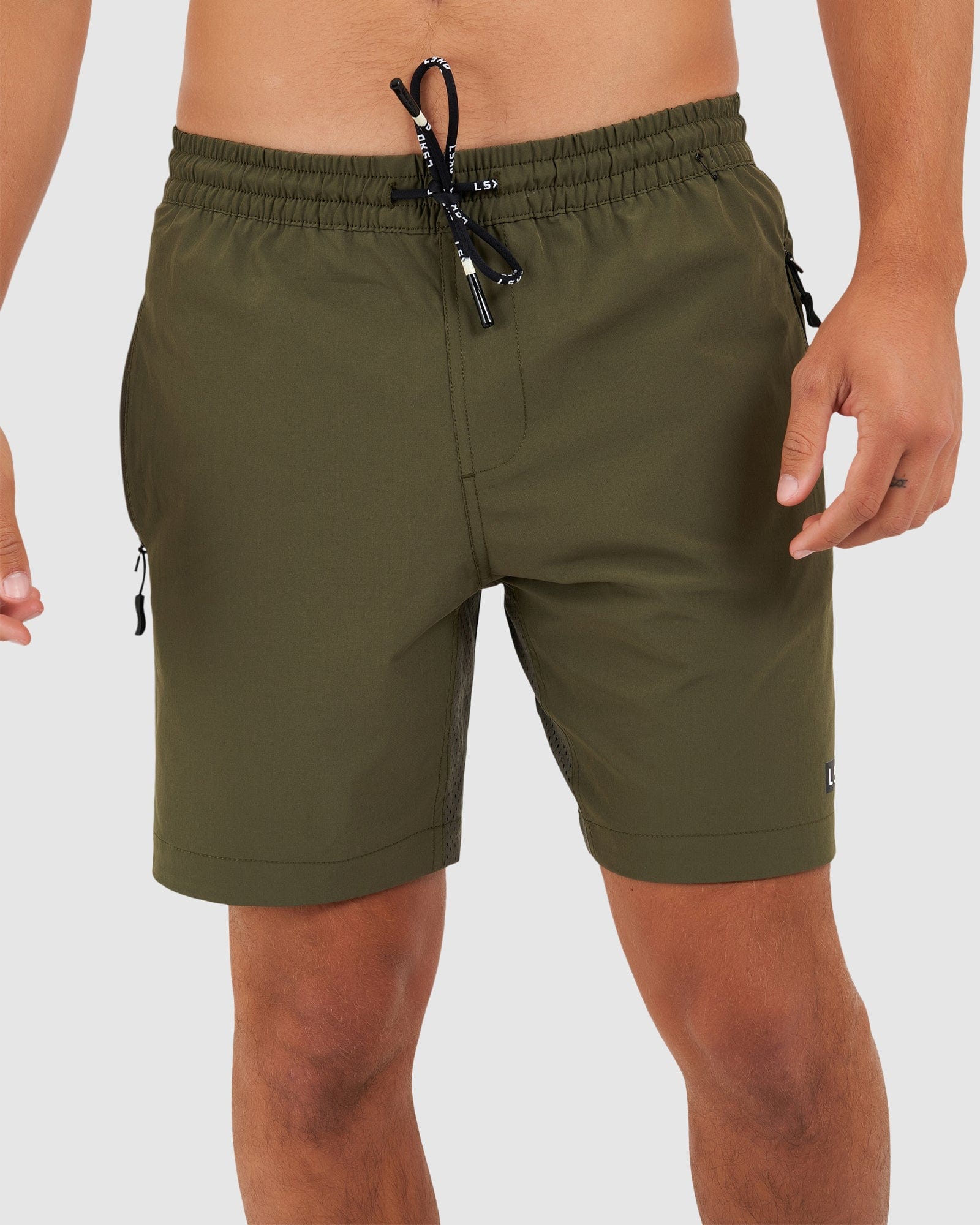 Model wearing Rep 7" Performance Short - Olive