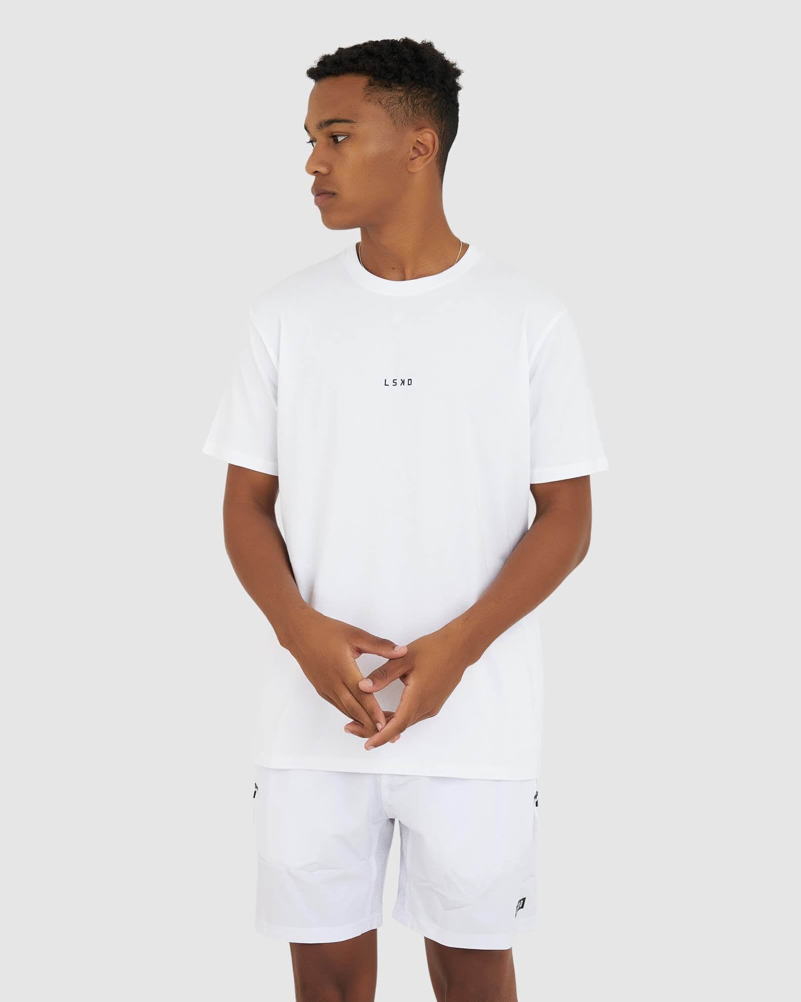 Model wearing Base Tee - White