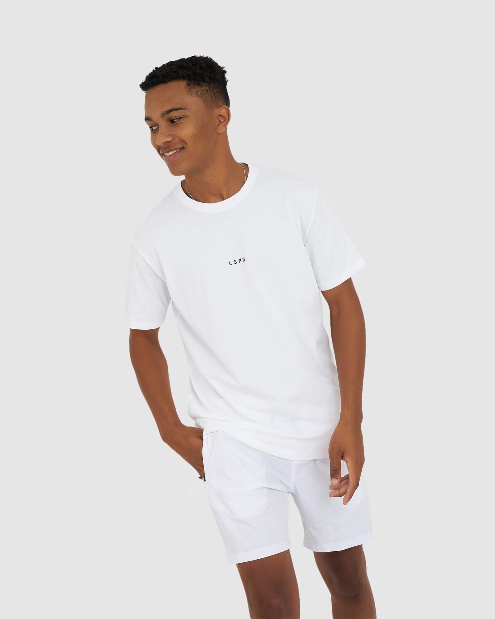 Model wearing Base Tee - White