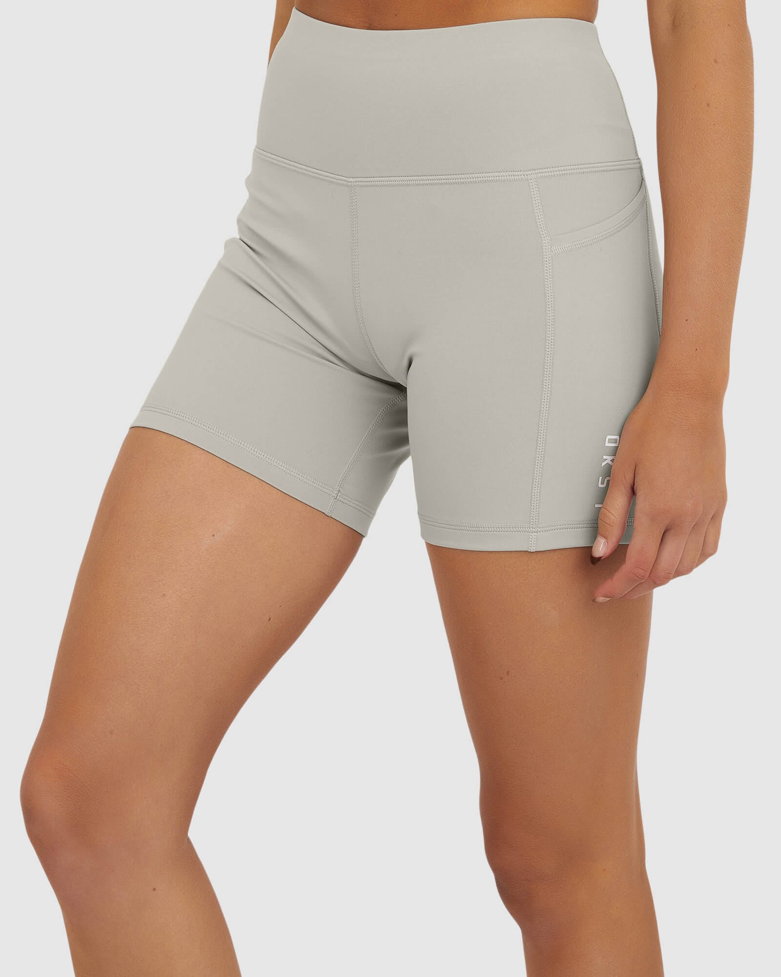 Model wearing Rep X-Short Tight Small Logo - Pussywillow