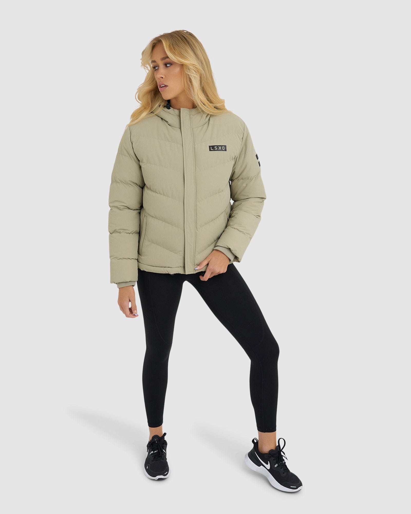 Model wearing Roasted Puffer Jacket 21  - Stone