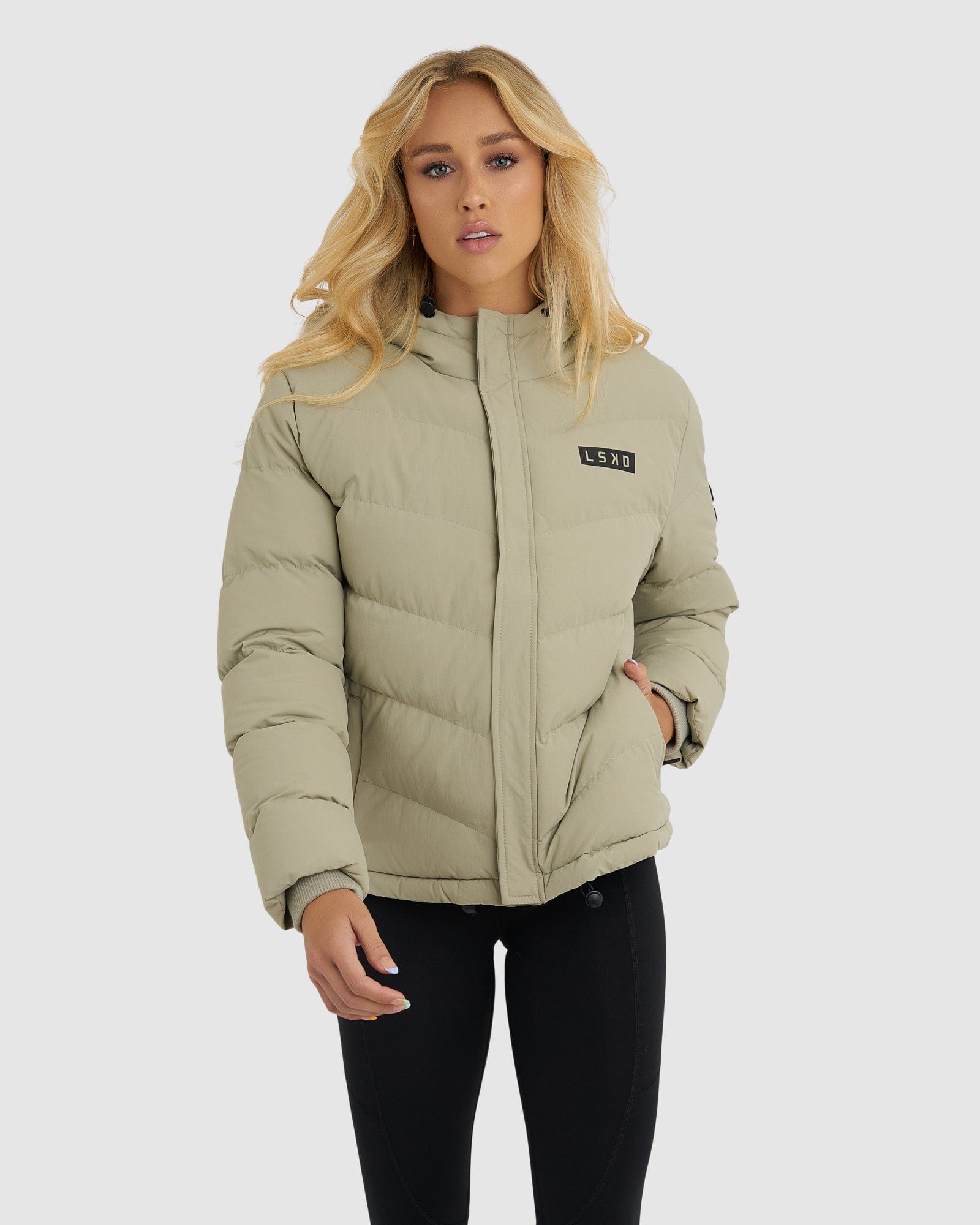 Model wearing Roasted Puffer Jacket 21  - Stone