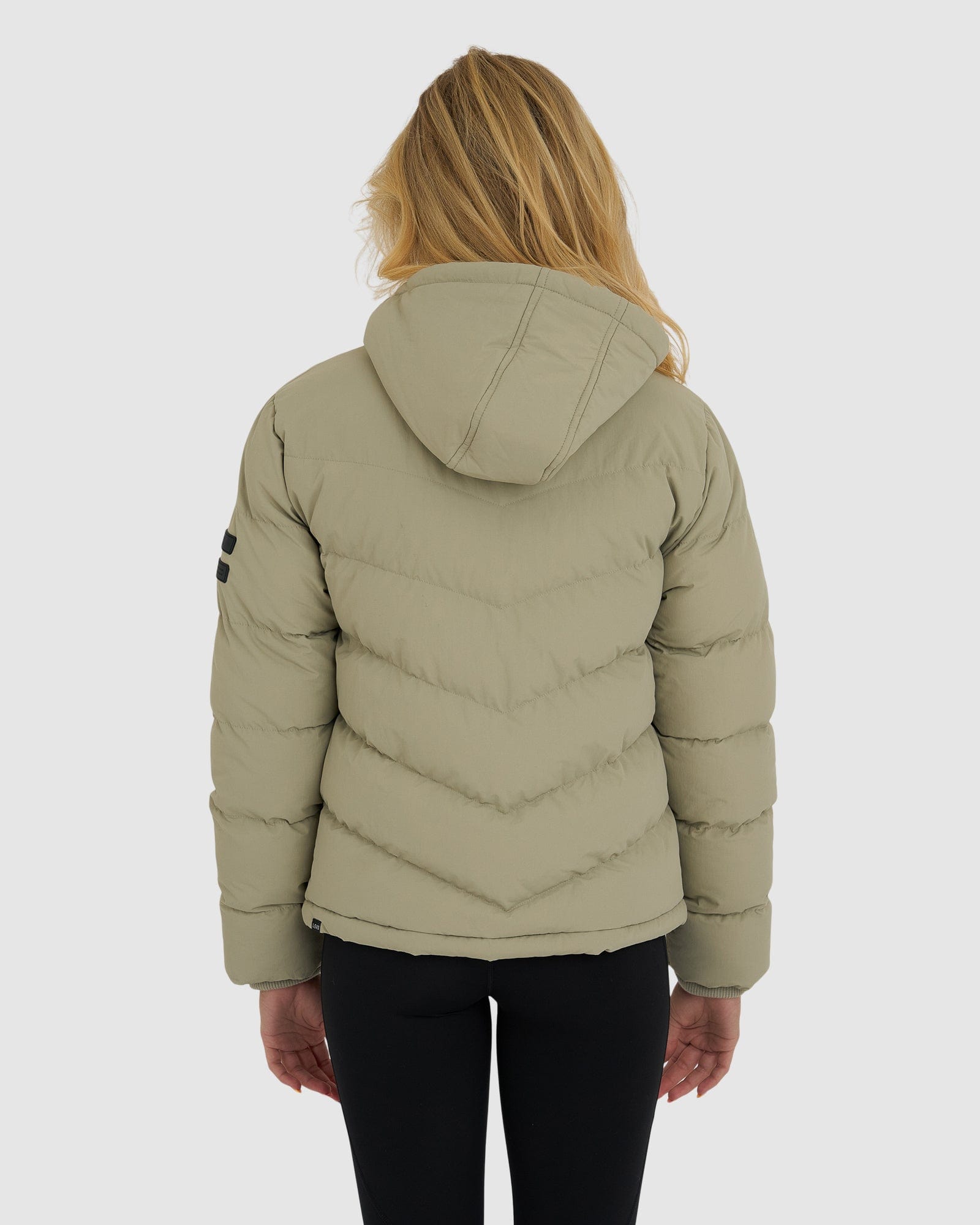 Model wearing Roasted Puffer Jacket 21  - Stone