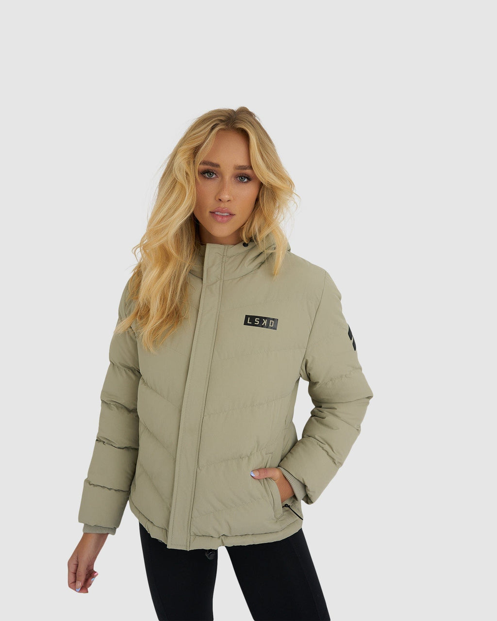 Model wearing Roasted Puffer Jacket 21  - Stone