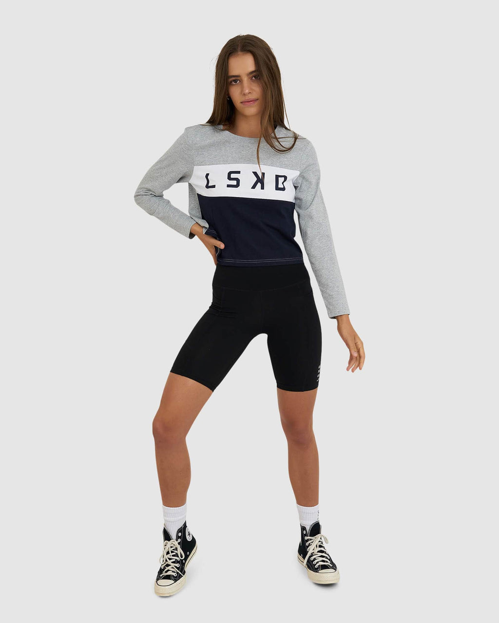 Model wearing Dough LS Tee - Lt Grey Marl-Navy