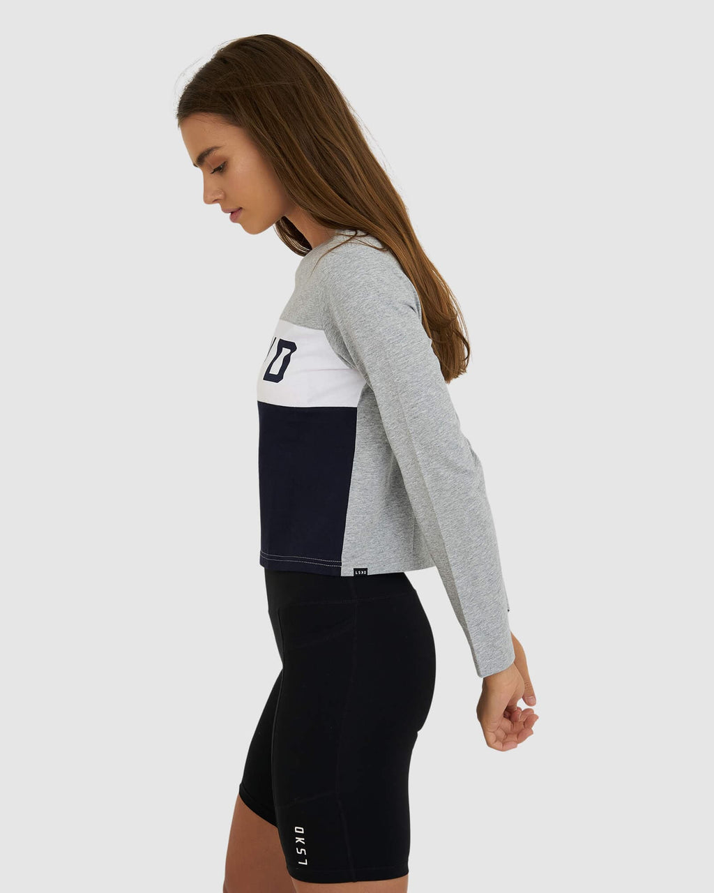 Model wearing Dough LS Tee - Lt Grey Marl-Navy