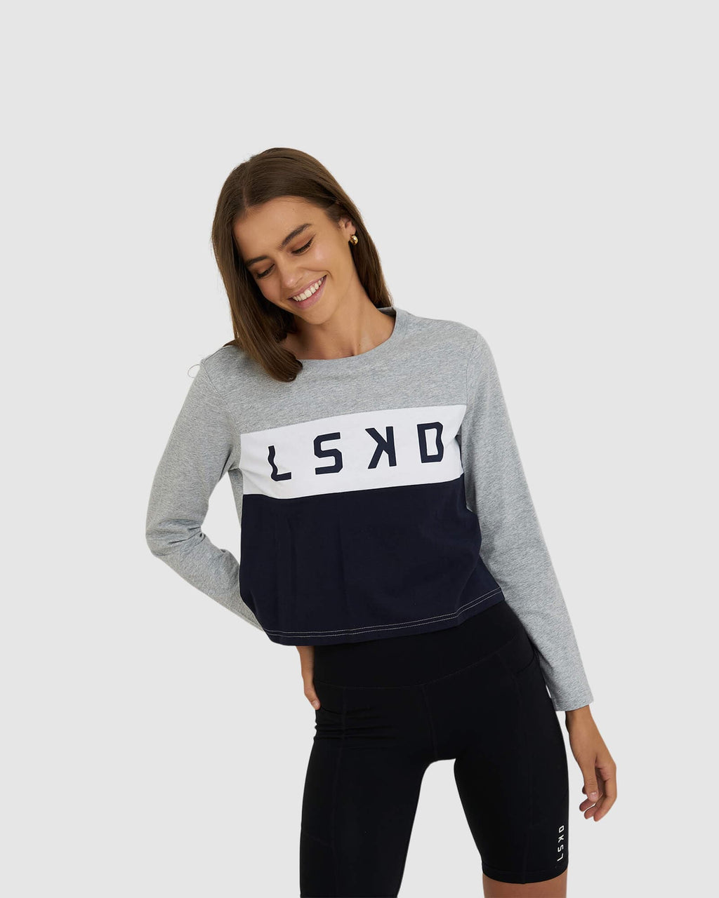 Model wearing Dough LS Tee - Lt Grey Marl-Navy