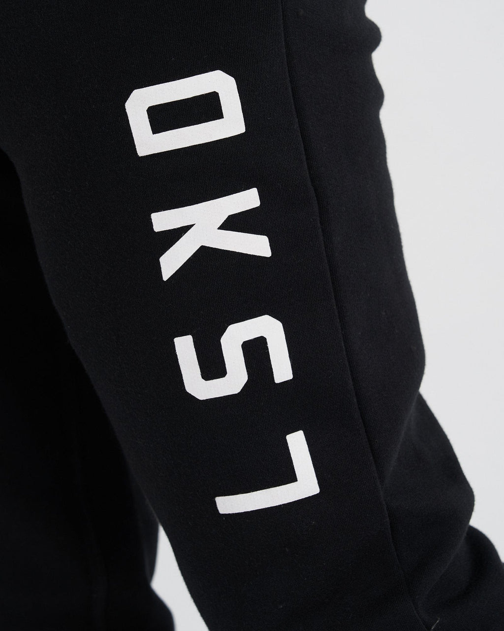 Model wearing Structure Track Pant - Black-White