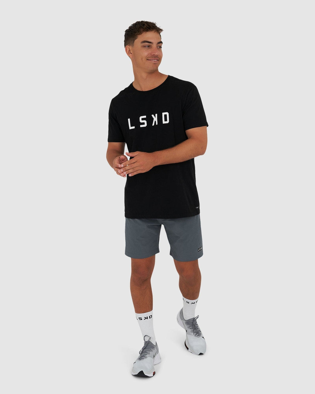 Model wearing Rep 7" Performance Short - Turbulence