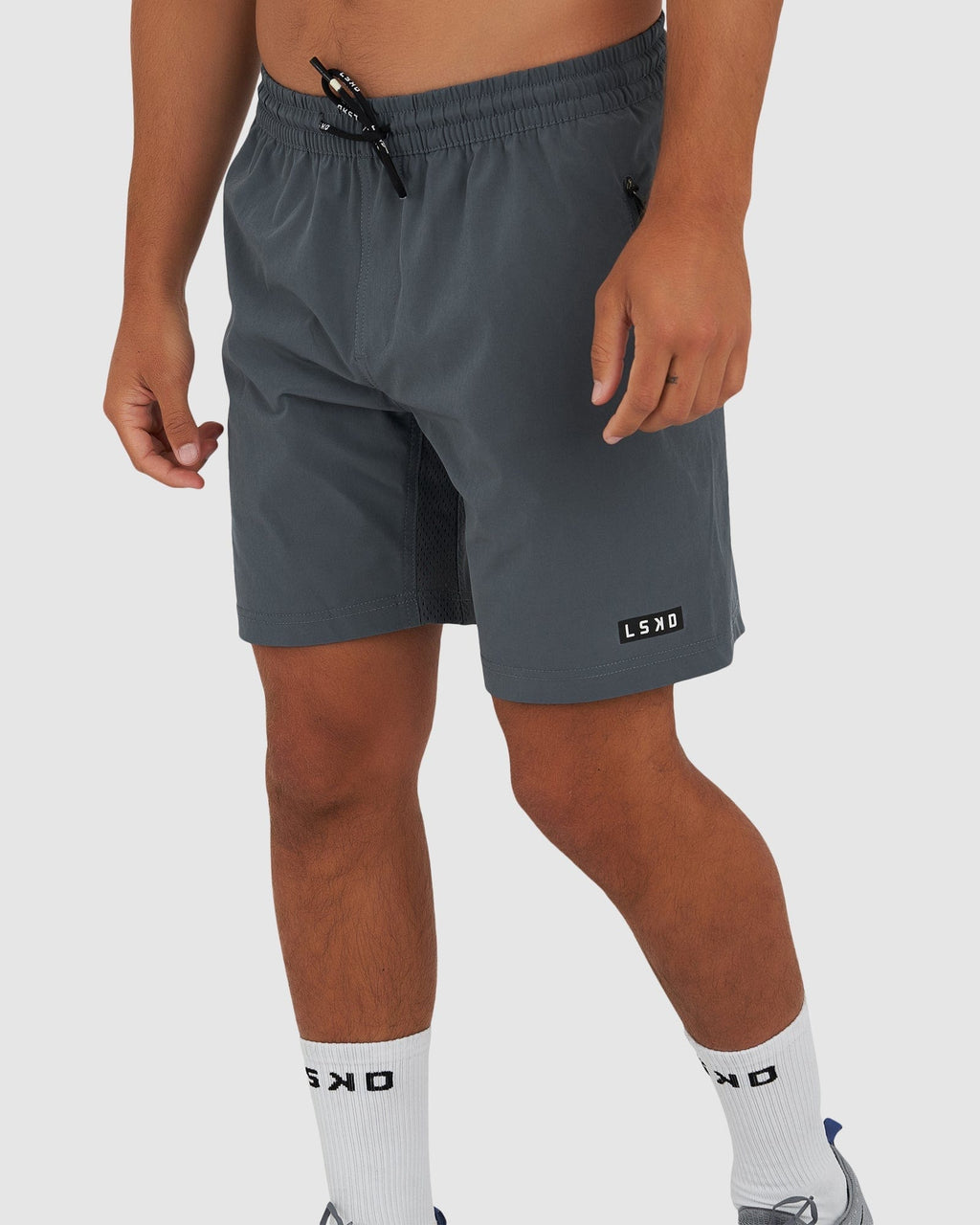 Model wearing Rep 7" Performance Short - Turbulence