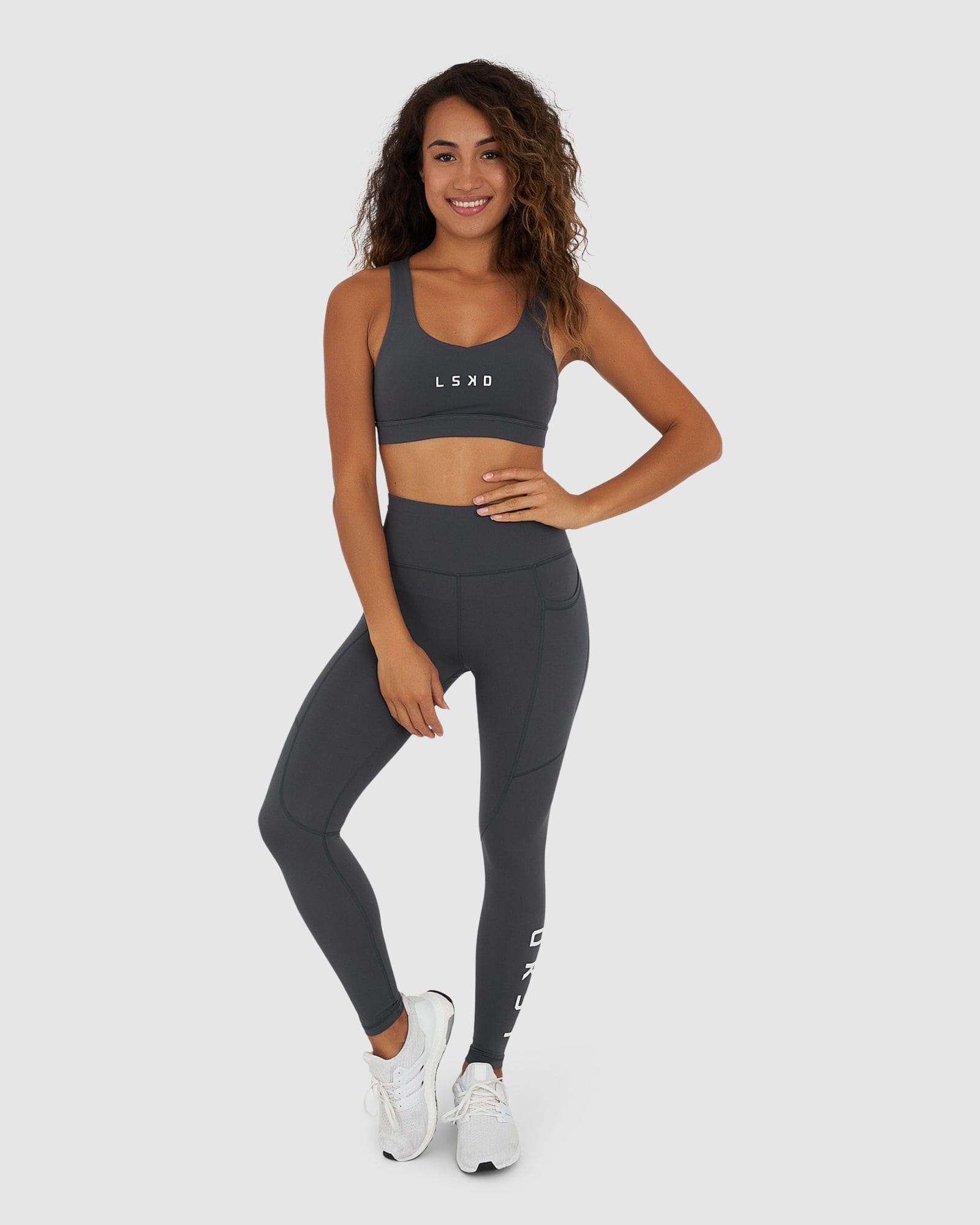 Model wearing Rep Sports Bra Small Logo - Turbulence