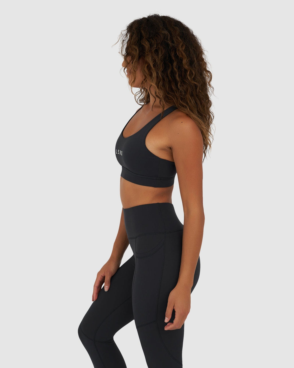 Model wearing Rep Sports Bra Small Logo - Midnight