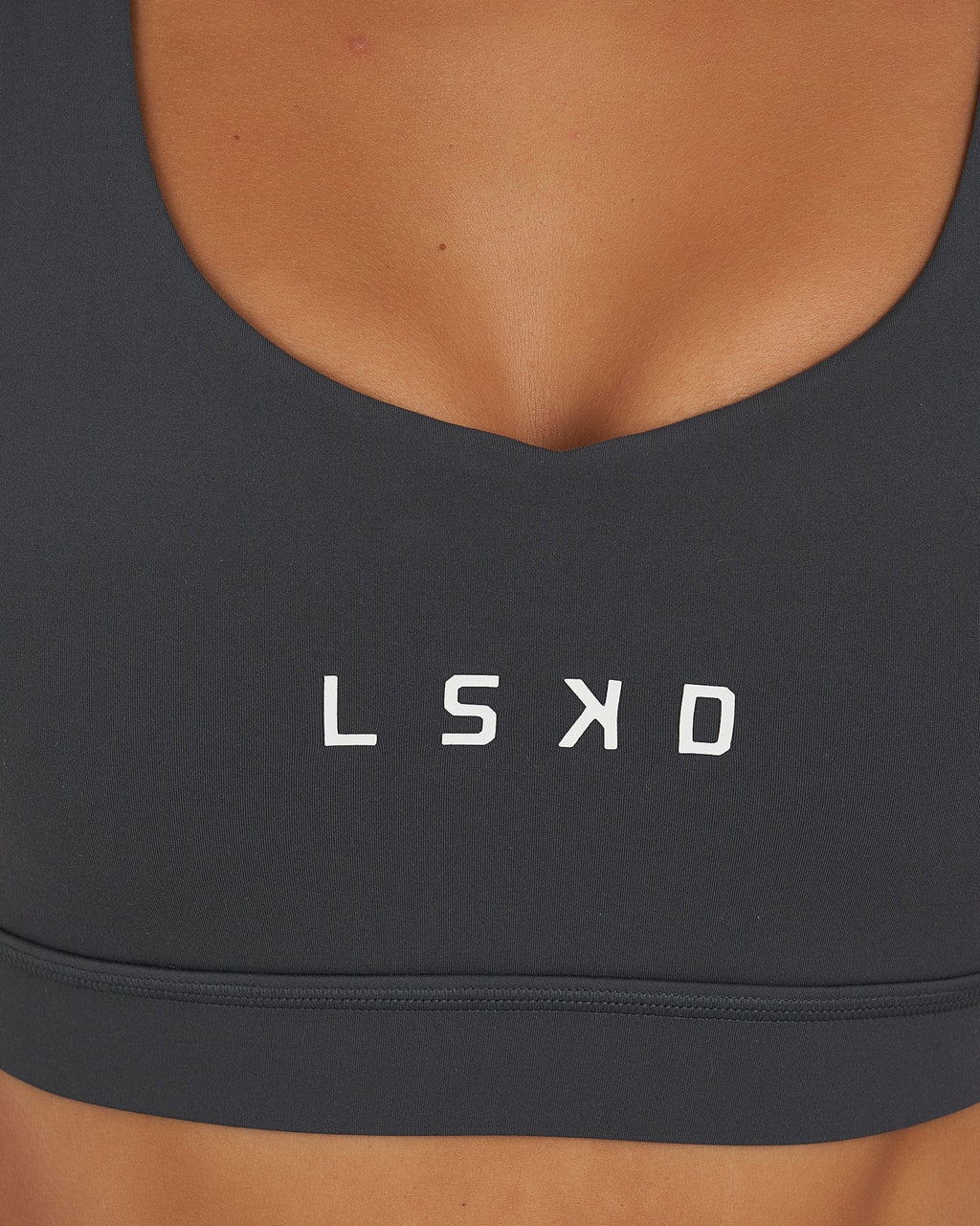 Model wearing Rep Sports Bra Small Logo - Turbulence