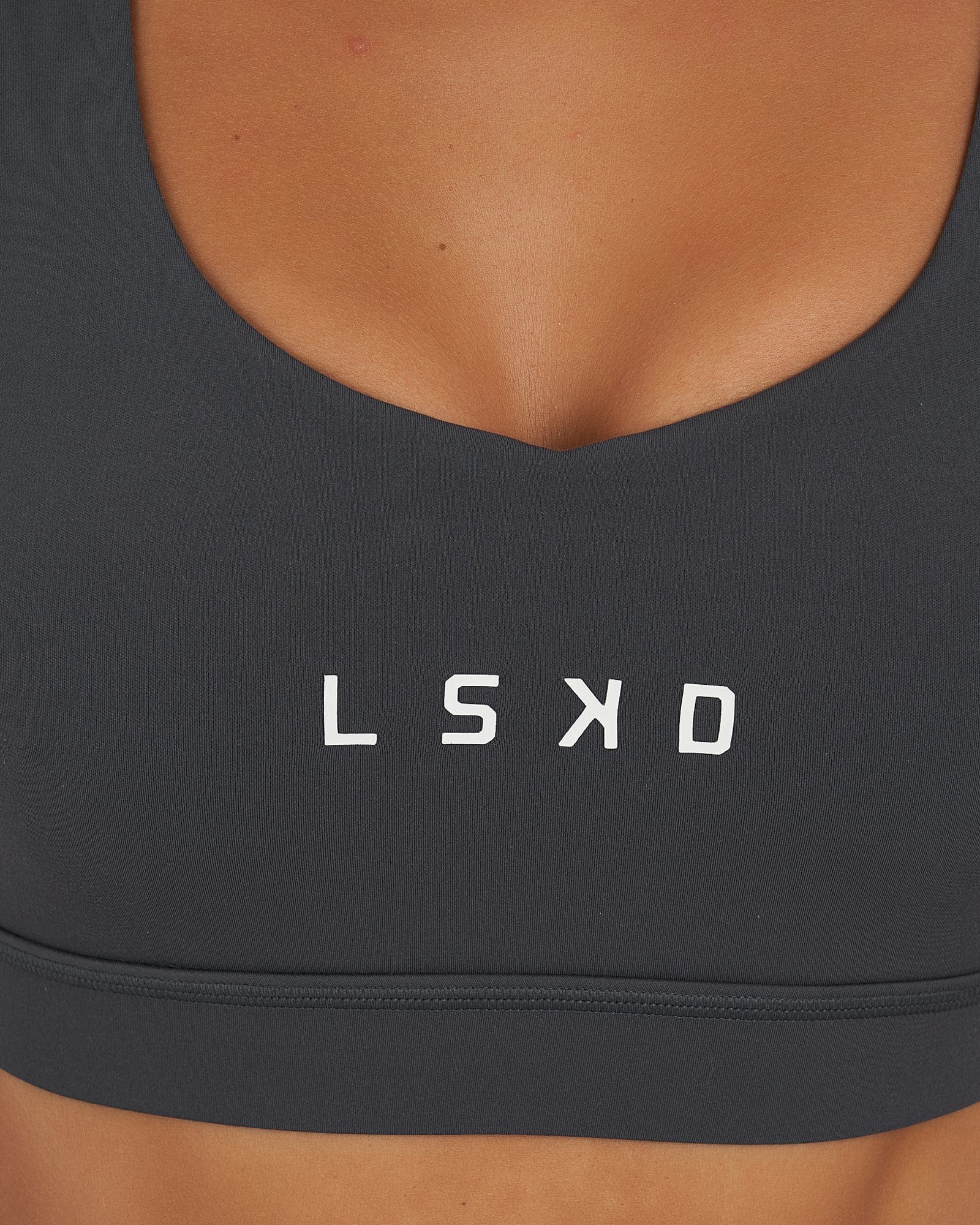 Model wearing Rep Sports Bra Small Logo - Turbulence