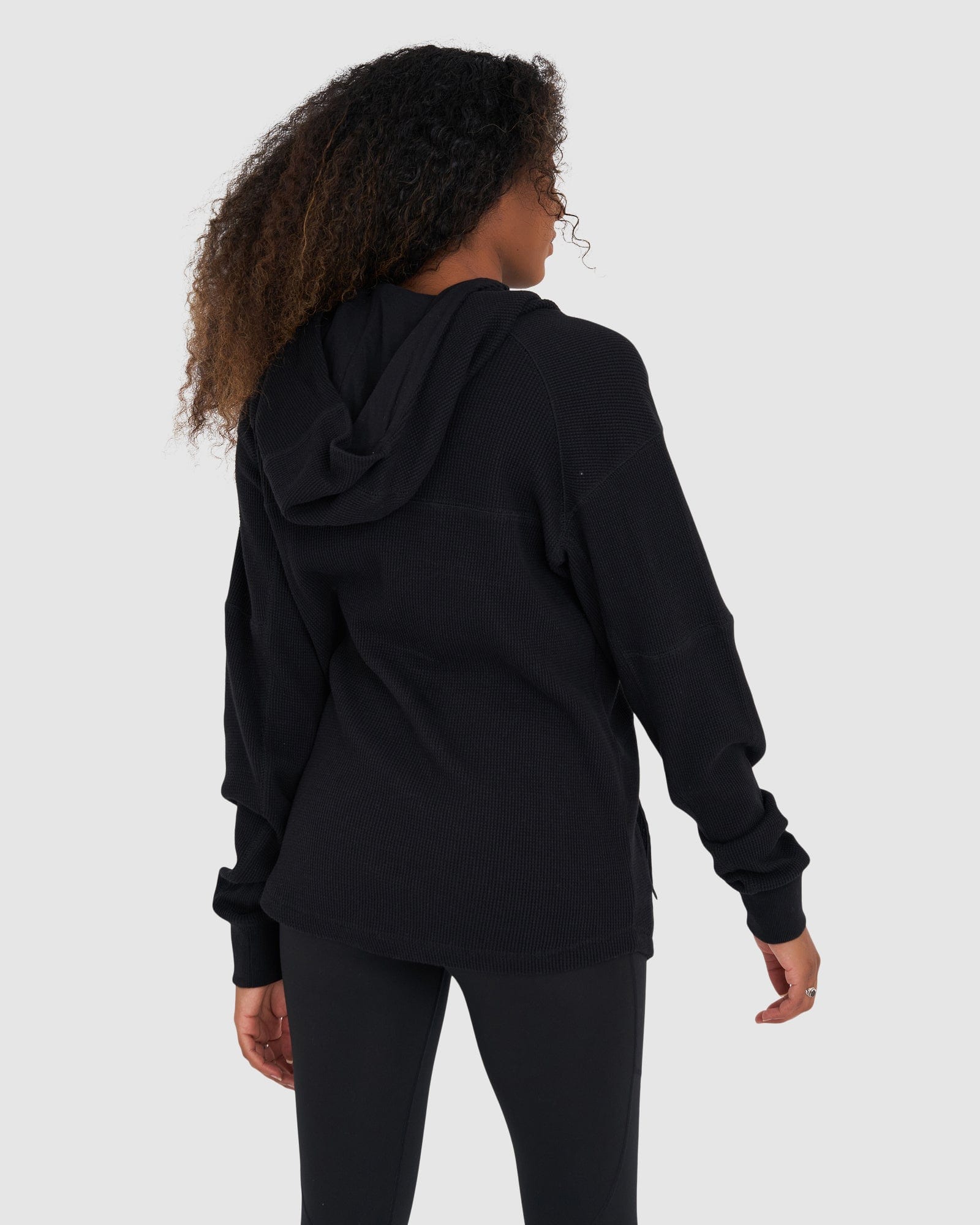 Model wearing Unisex 5am Waffle Hood - Black-Black