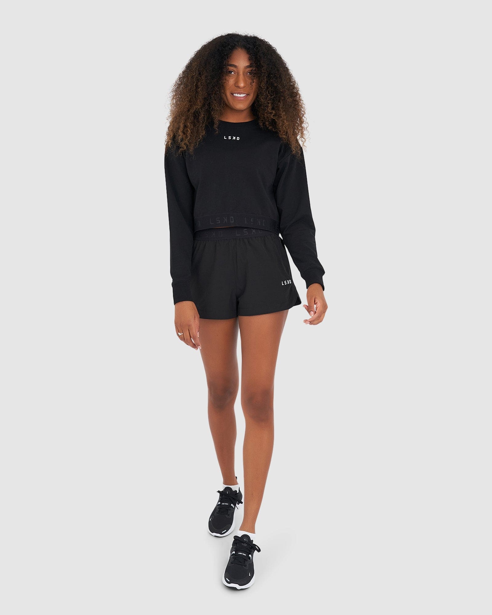 Model wearing Competition Sweater - Black