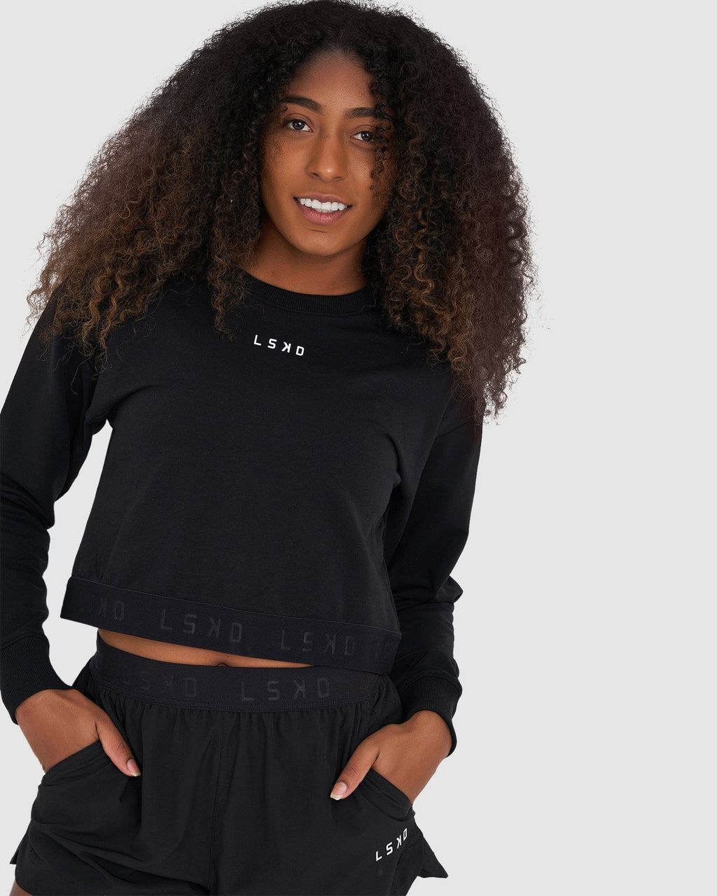 Model wearing Competition Sweater - Black
