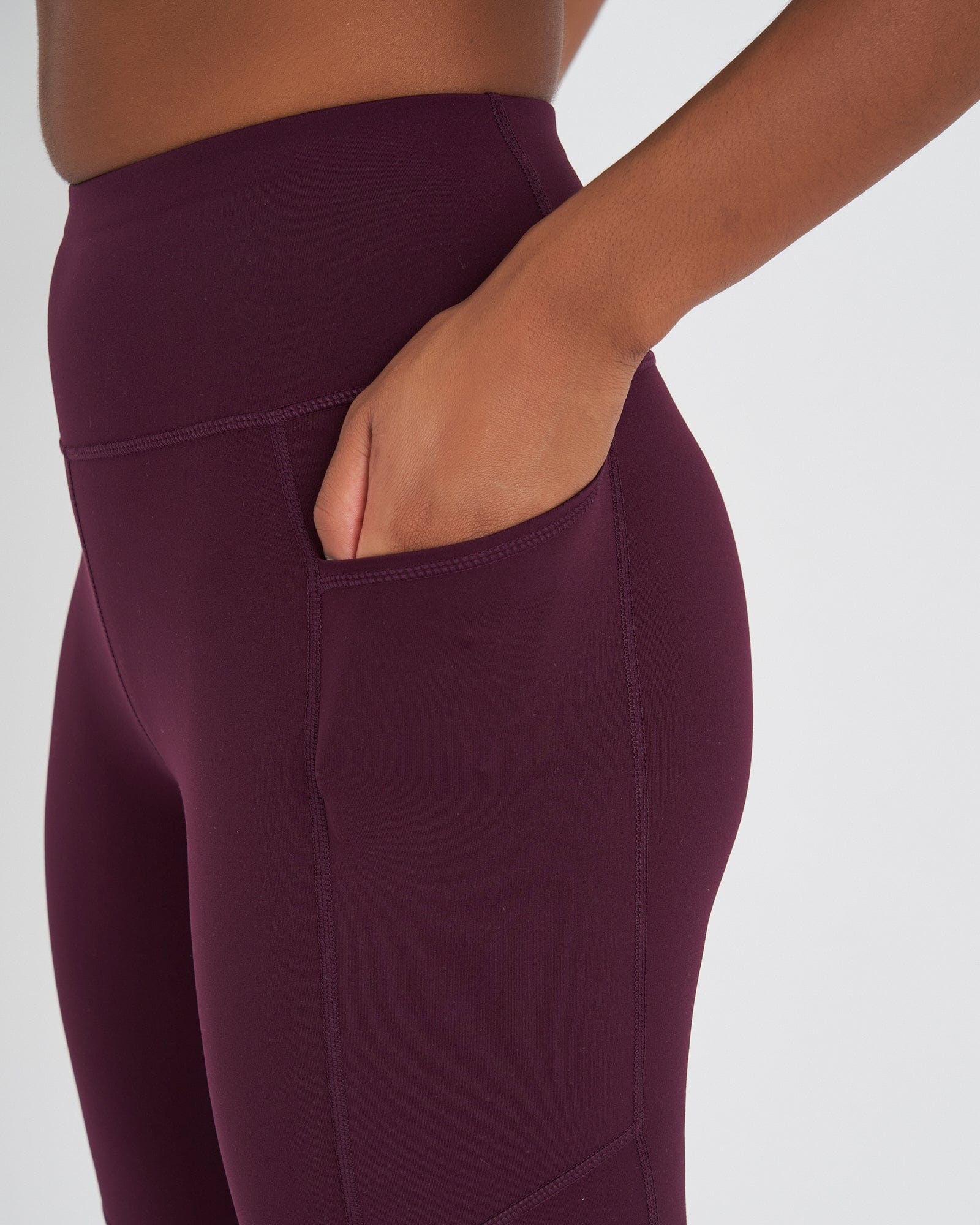 Model wearing Rep Short Tight Small Logo - Wine