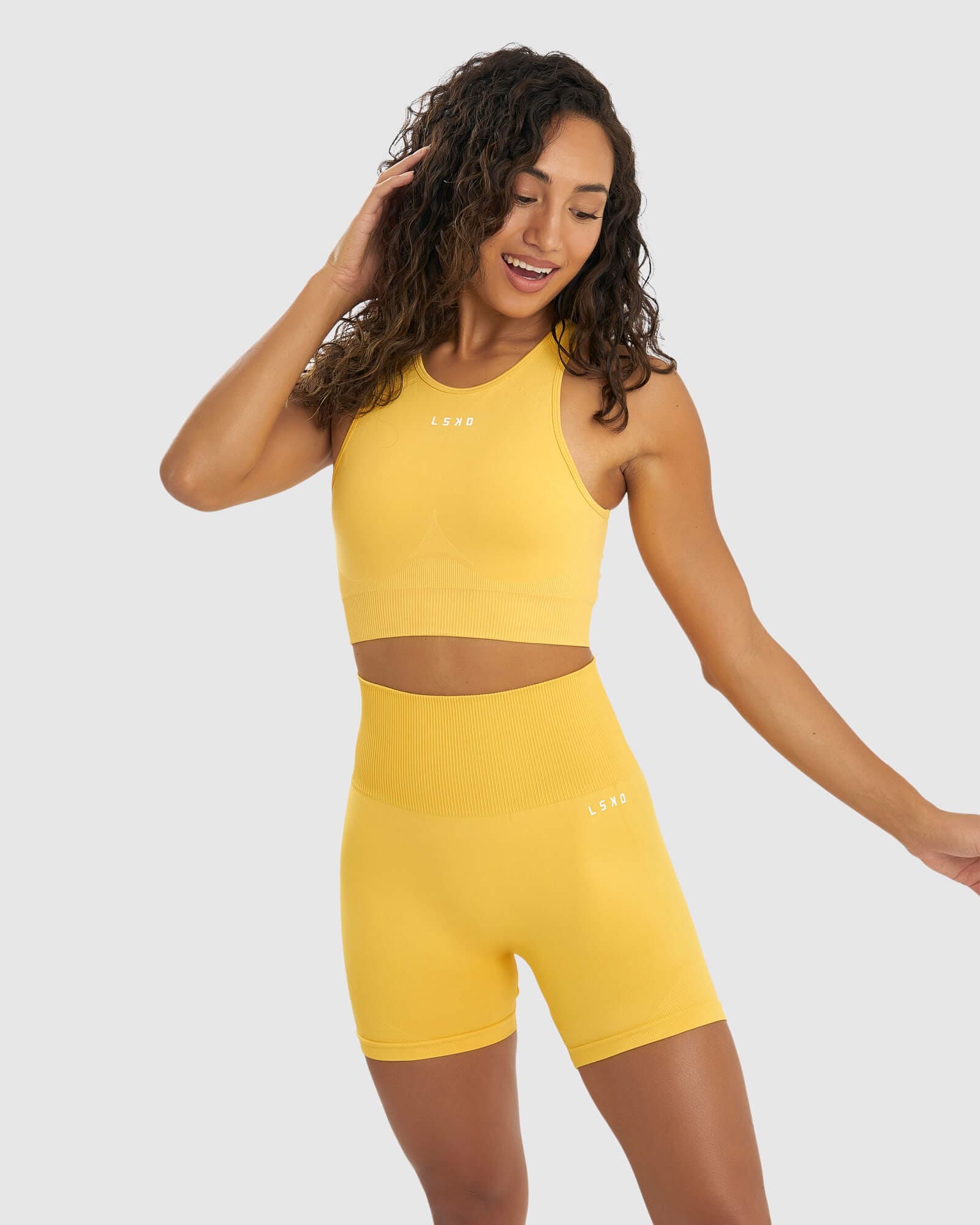 Model wearing Limitless Seamless Crop Top - Sunny