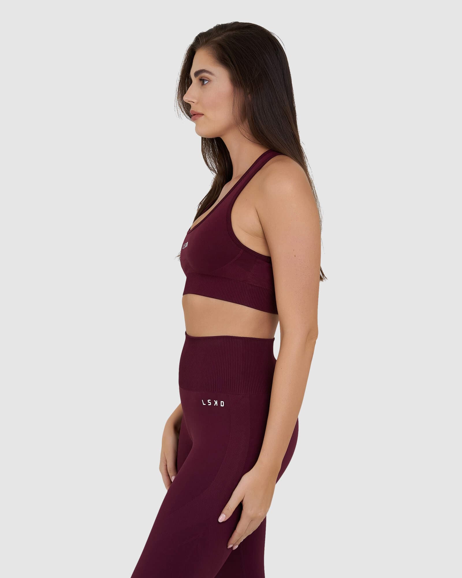 Model wearing Limitless Seamless Sports Bra - Wine