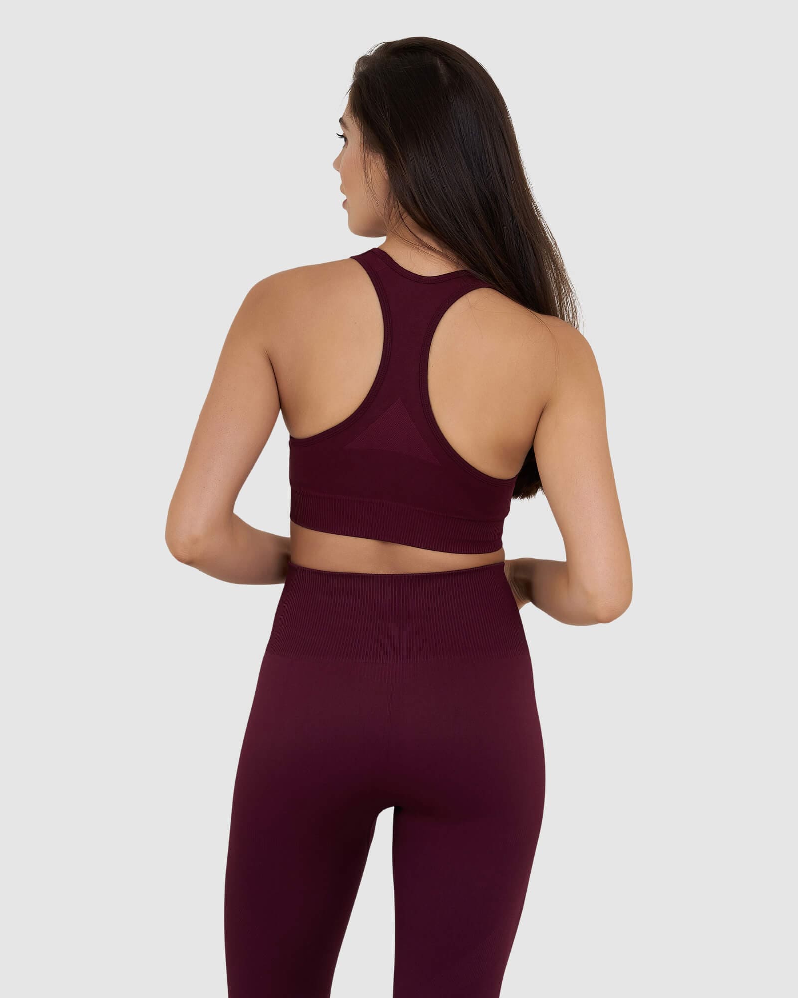 Model wearing Limitless Seamless Sports Bra - Wine
