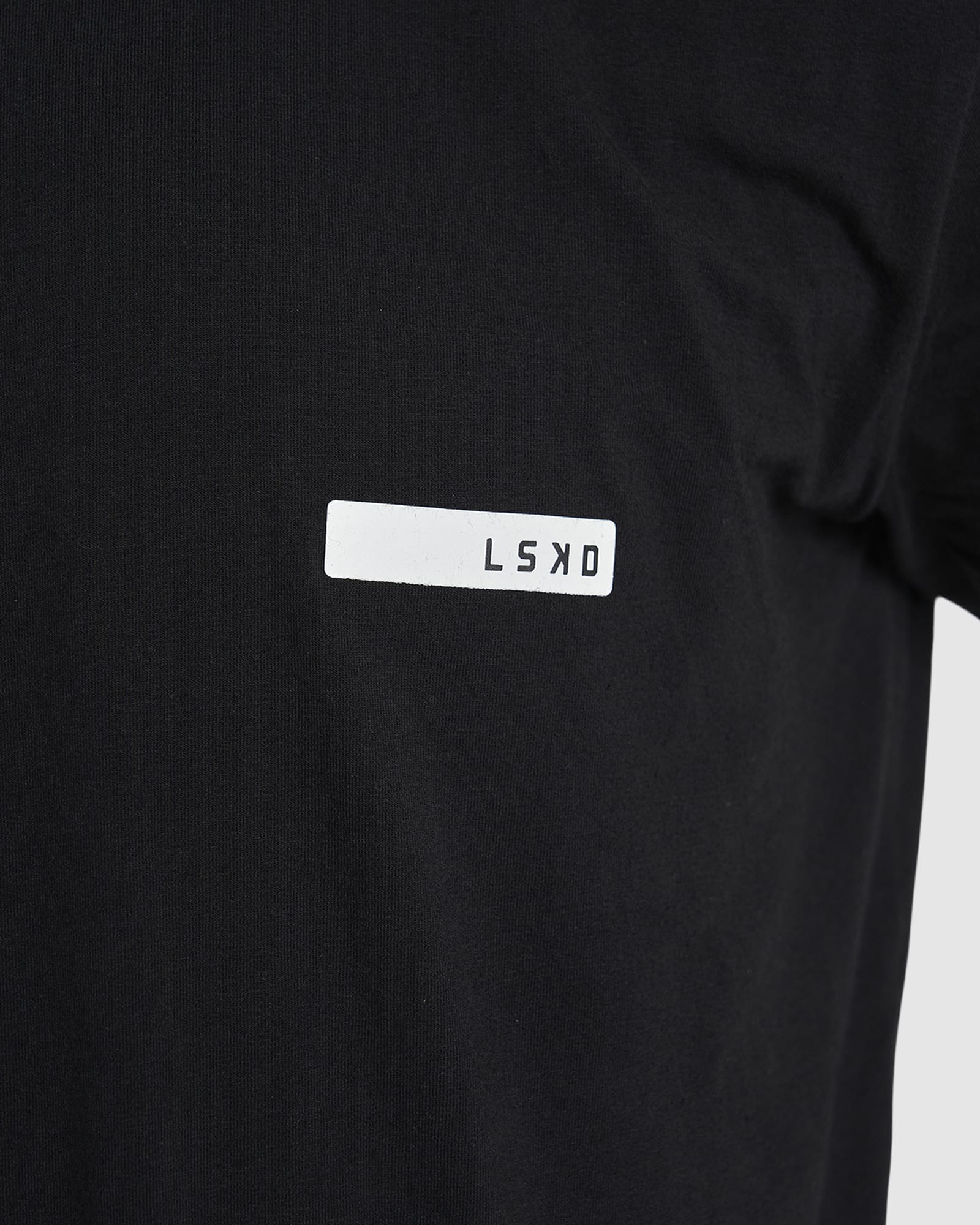 Model wearing LSKD x LM Tee - Black