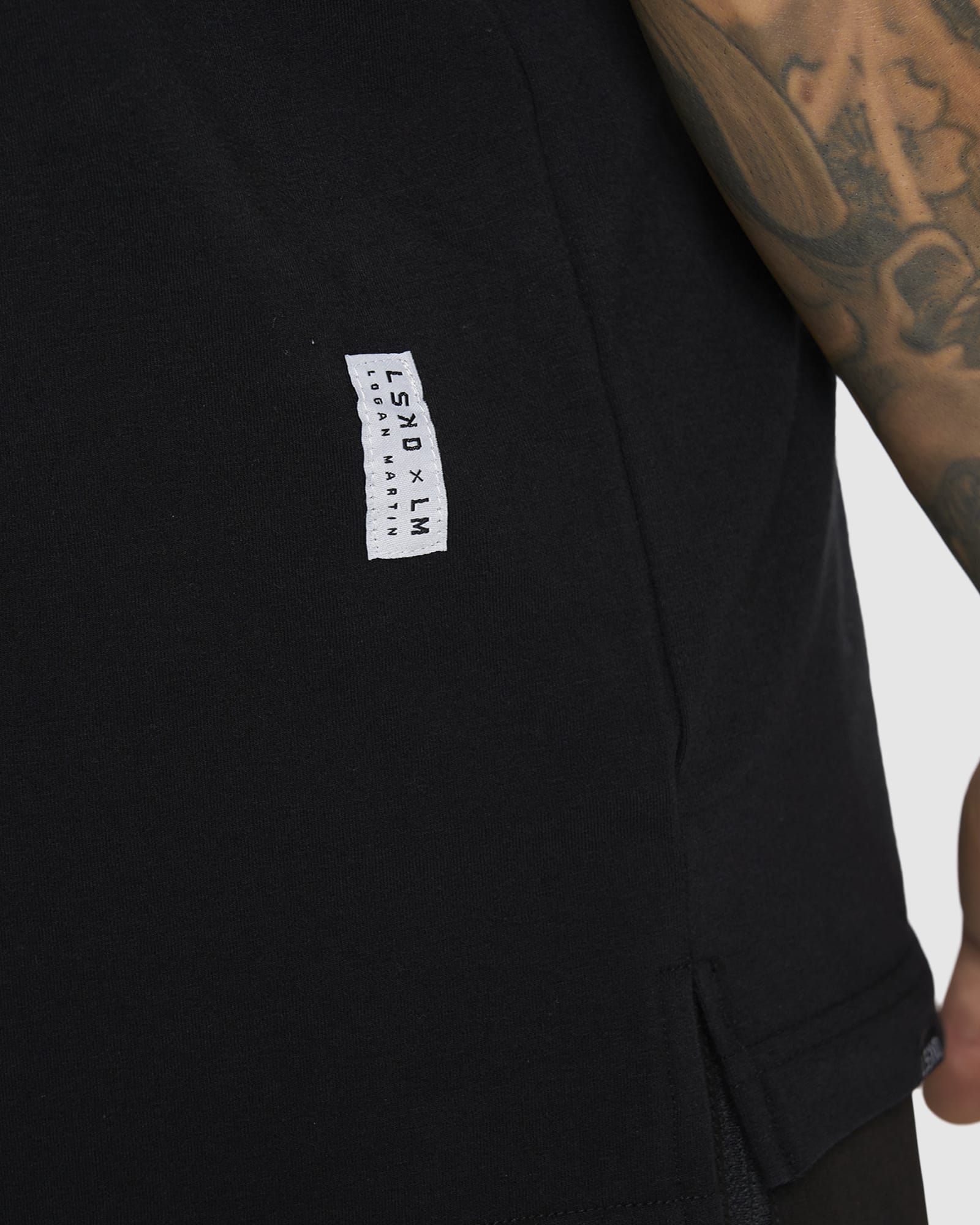 Model wearing LSKD x LM Tee - Black