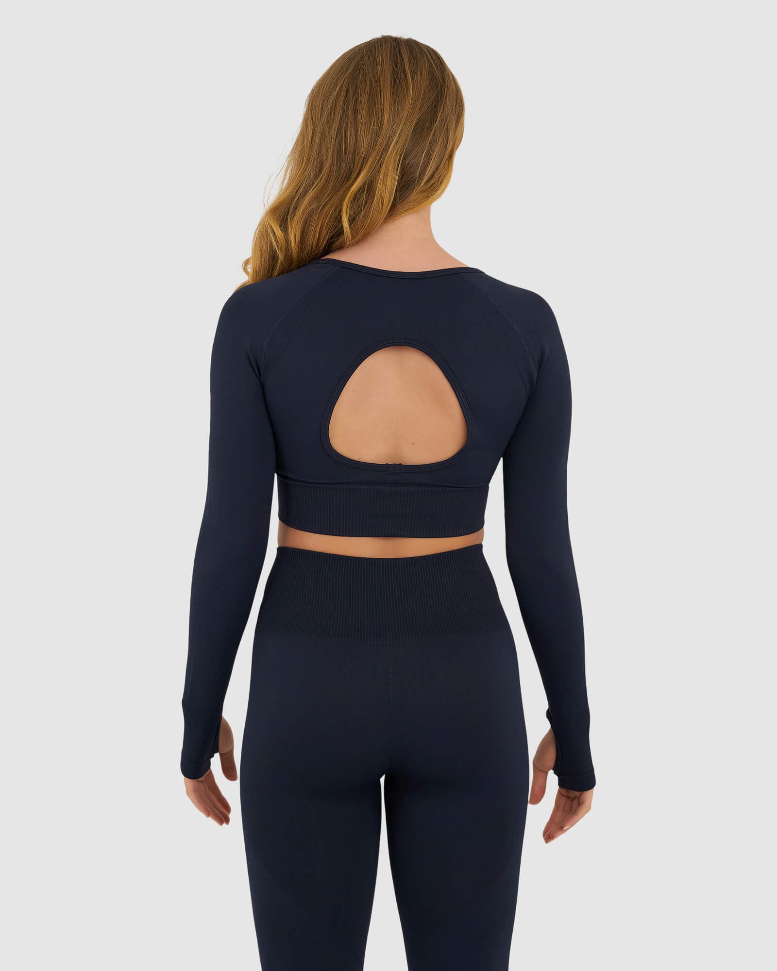 Model wearing Seamless LS Top - Navy