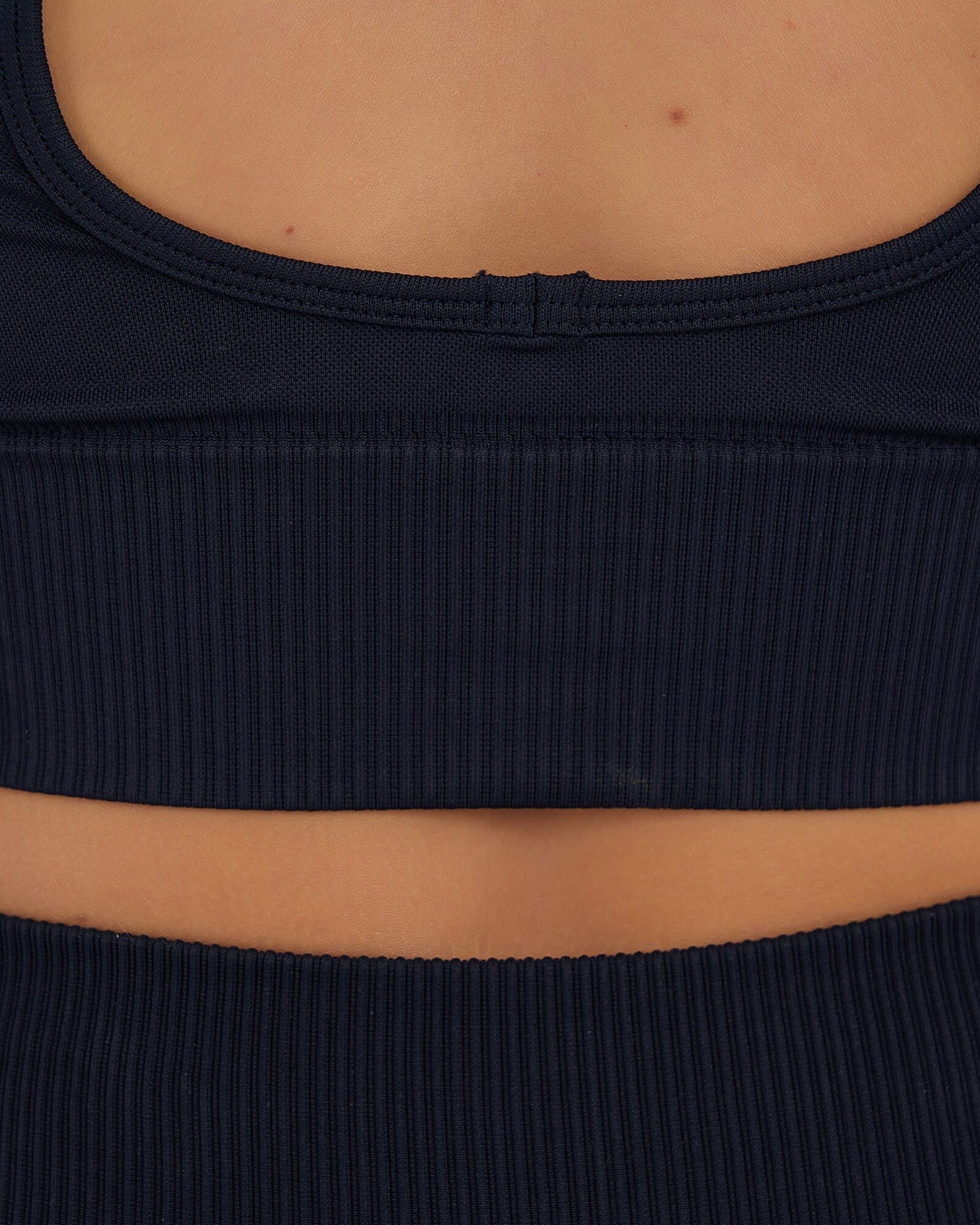 Model wearing Seamless LS Top - Navy