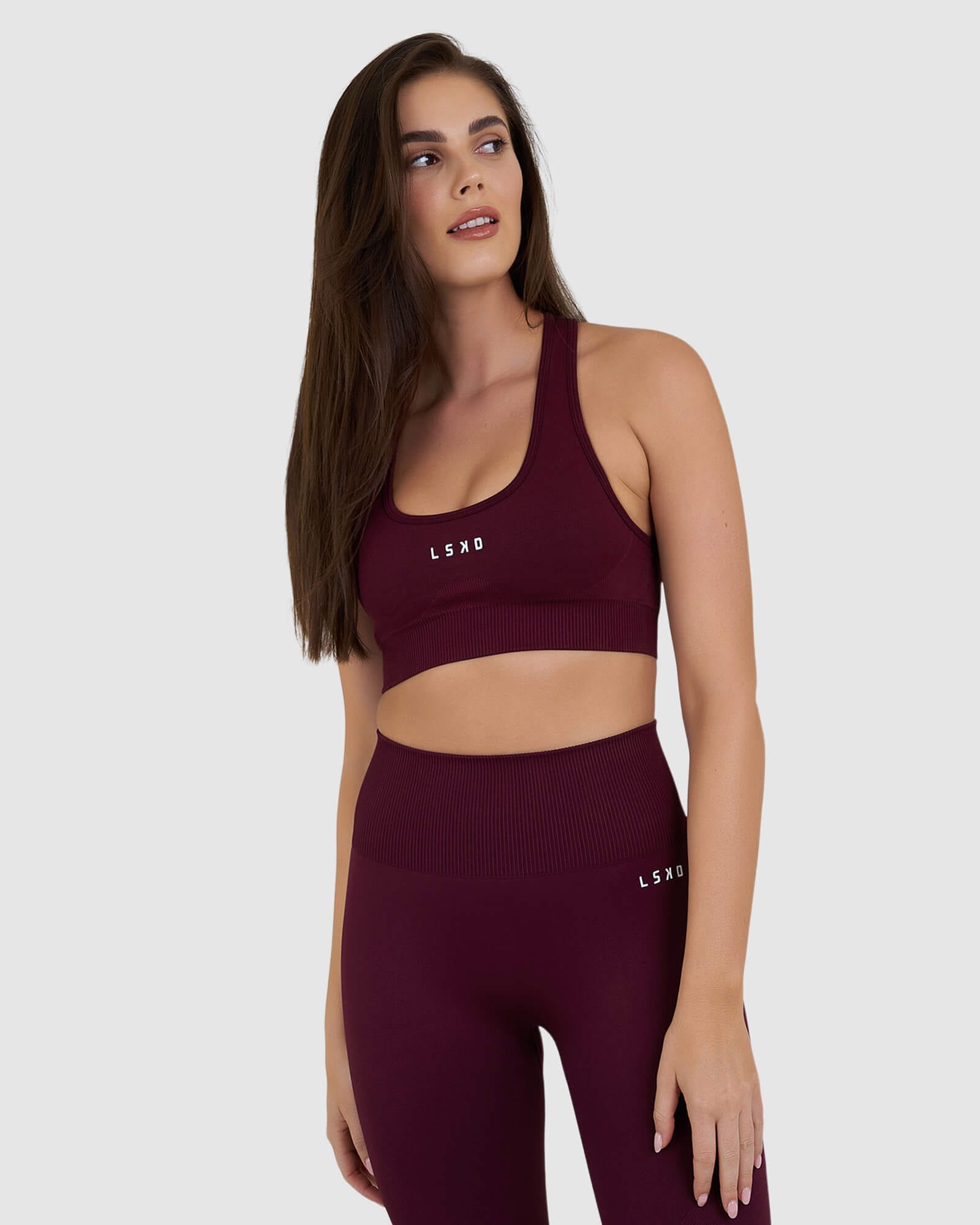 Model wearing Limitless Seamless Sports Bra - Wine