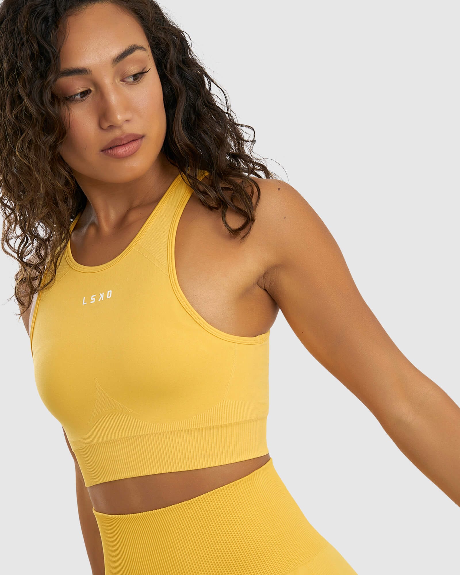 Model wearing Limitless Seamless Crop Top - Sunny