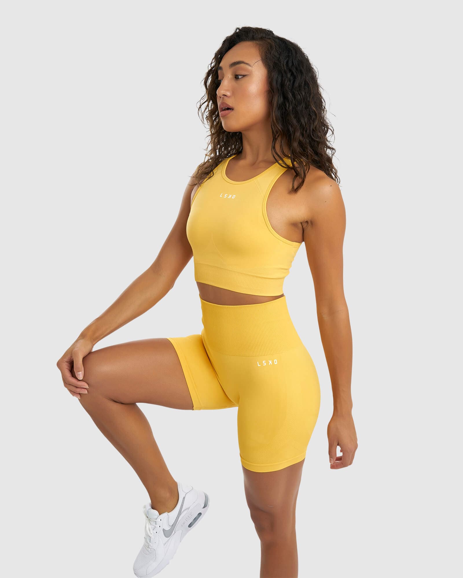 Model wearing Limitless Seamless Crop Top - Sunny