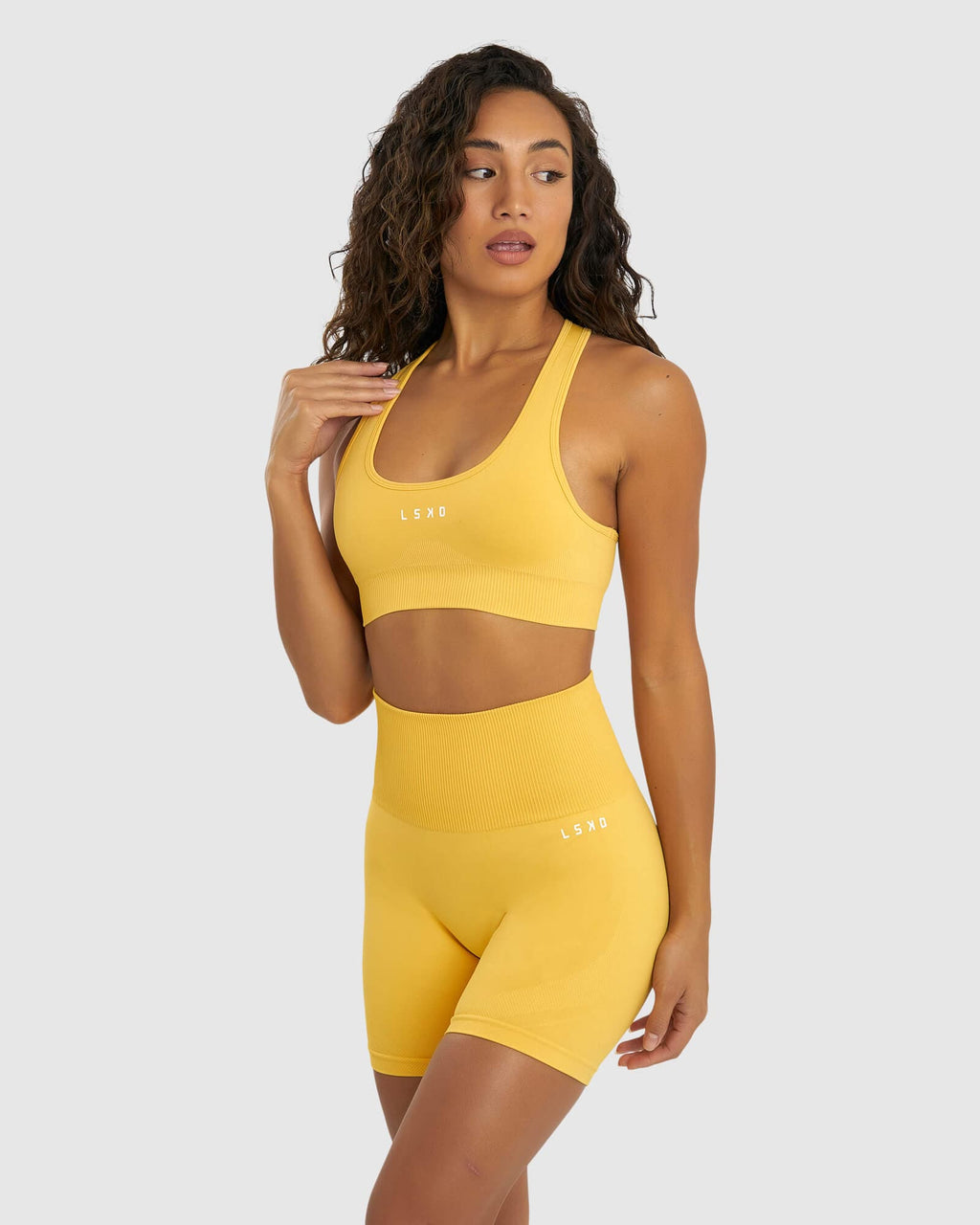 Model wearing Limitless Seamless Sports Bra - Sunny