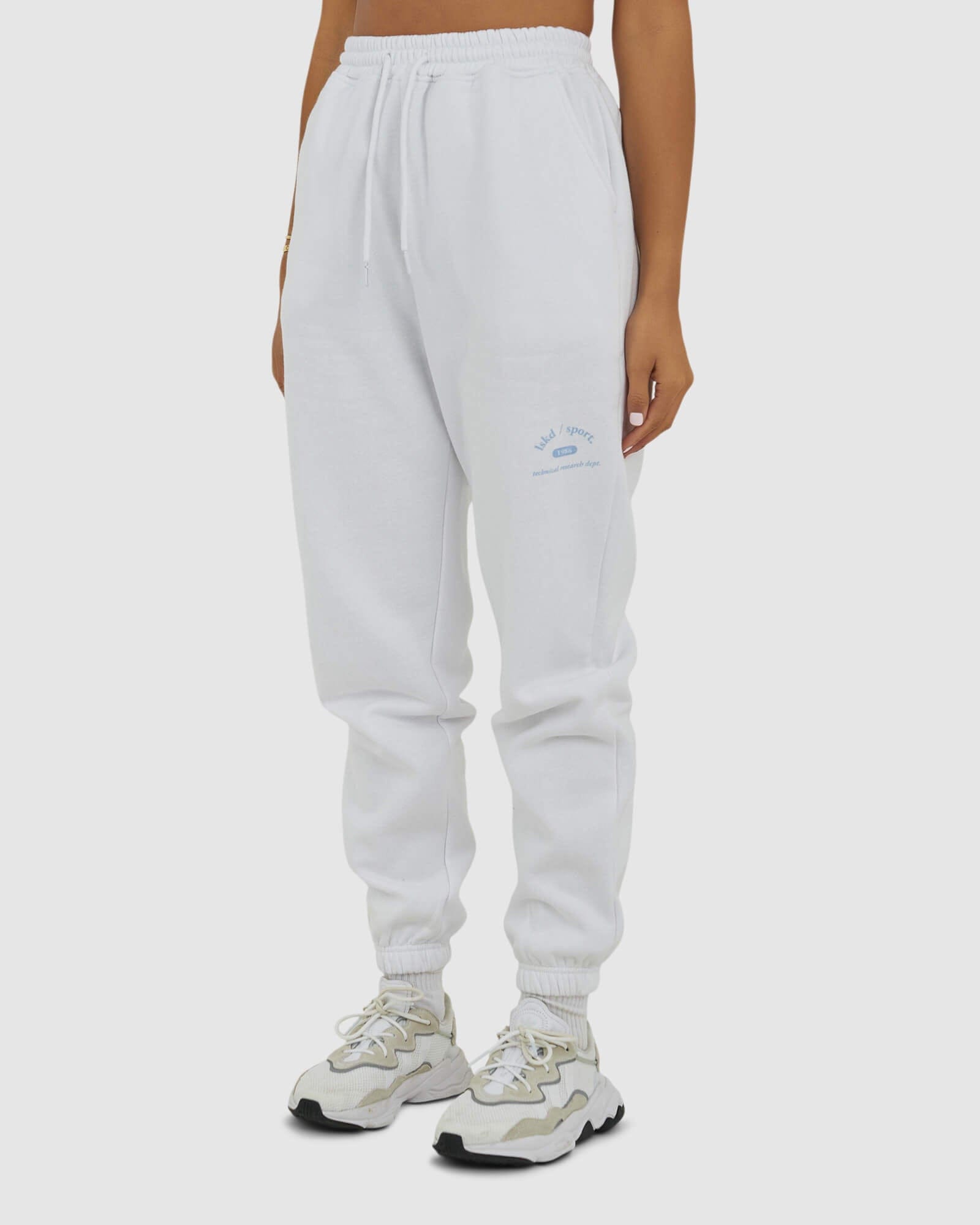 Model wearing 1986 Track Pant - White