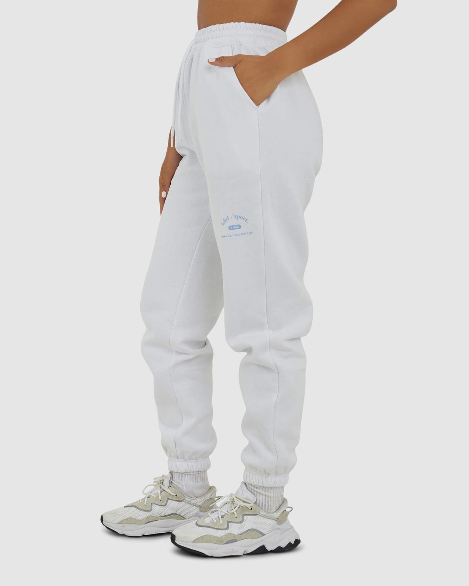 Model wearing 1986 Track Pant - White