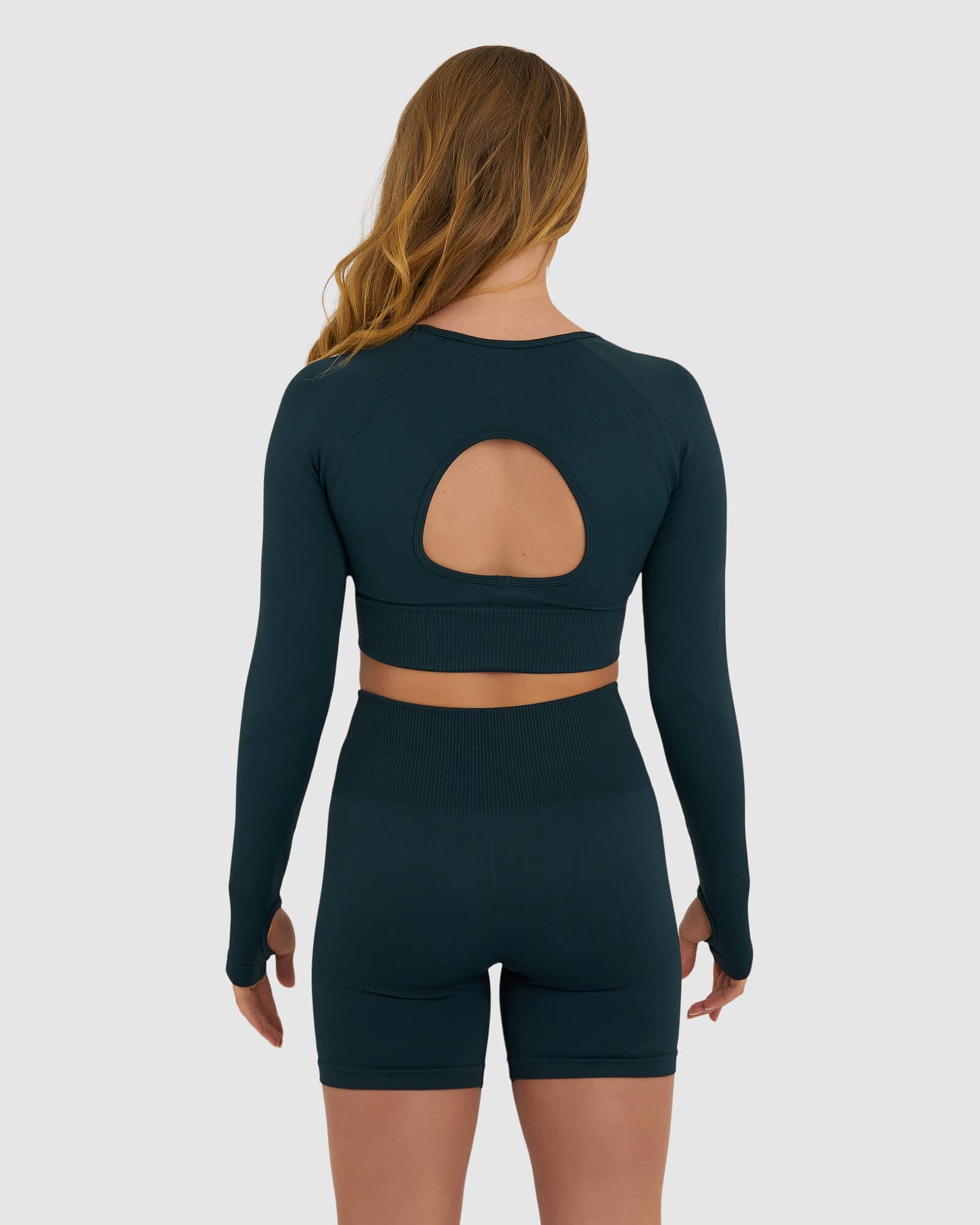 Model wearing Seamless LS Top - Deep Teal