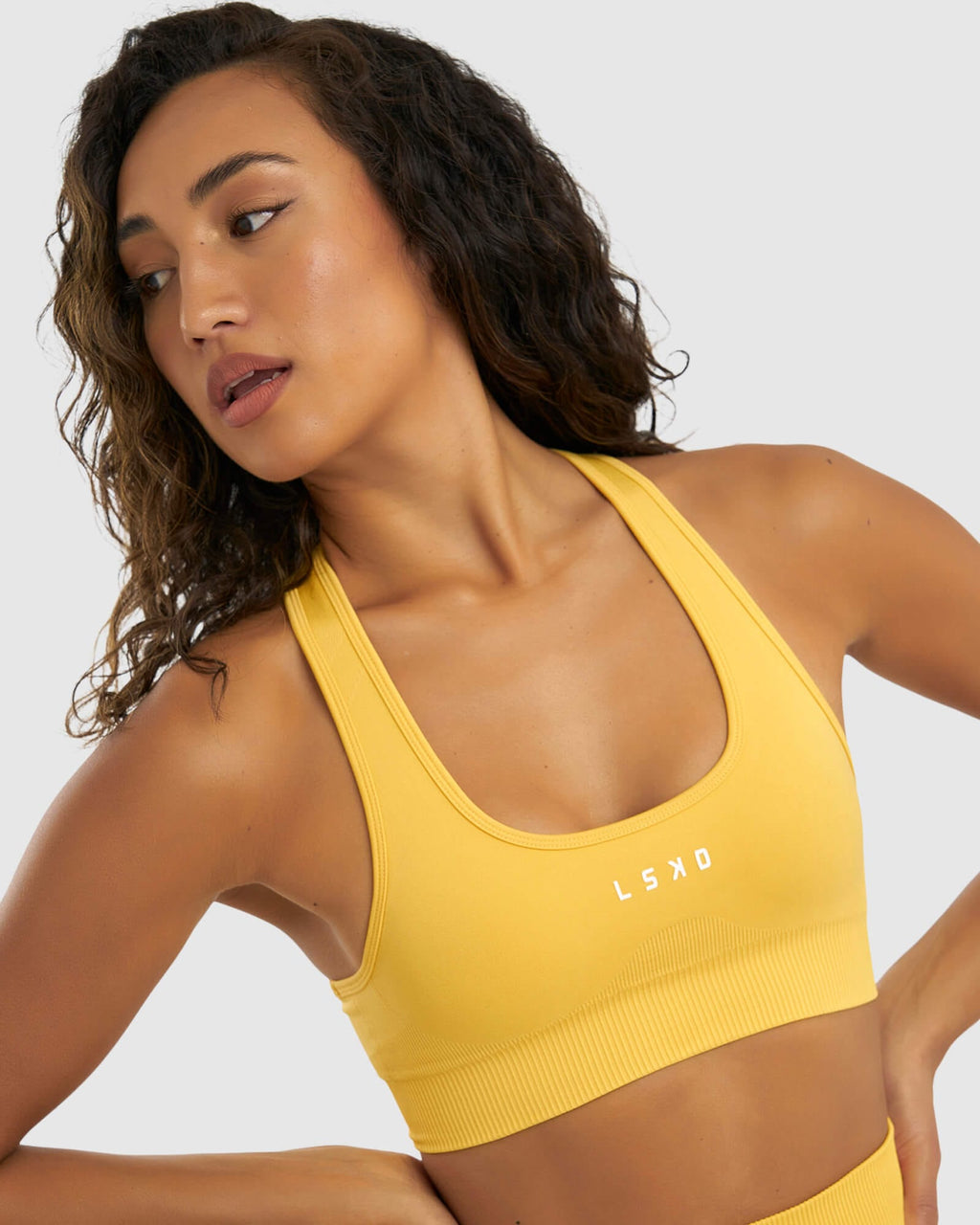 Model wearing Limitless Seamless Sports Bra - Sunny