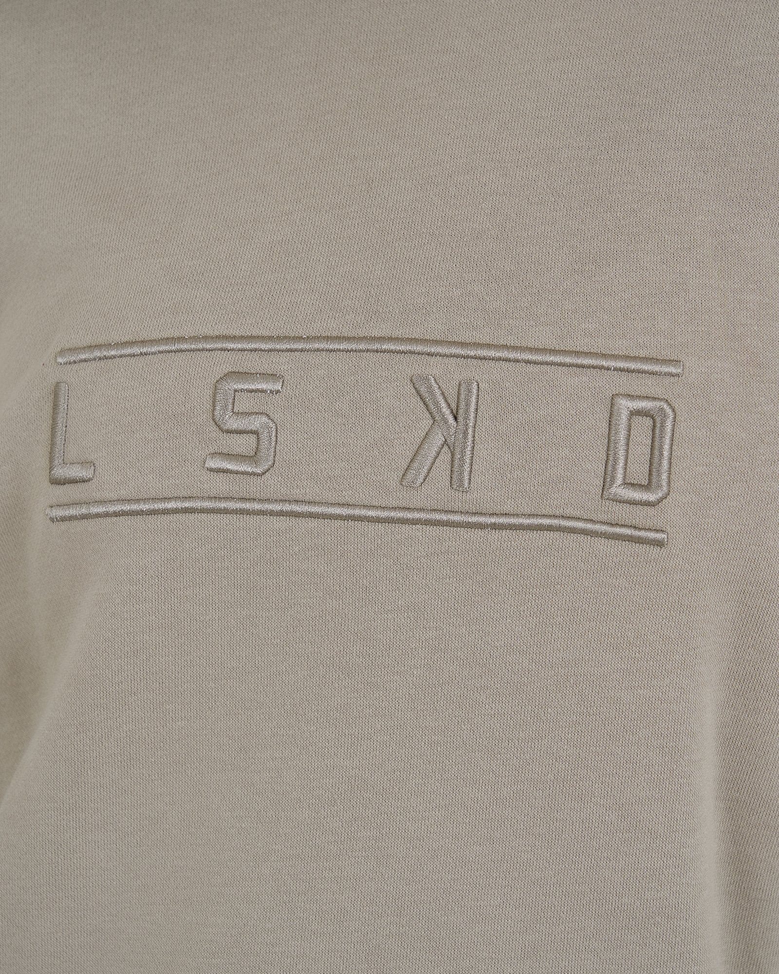 Model wearing Suspect Pullover Dress - Taupe