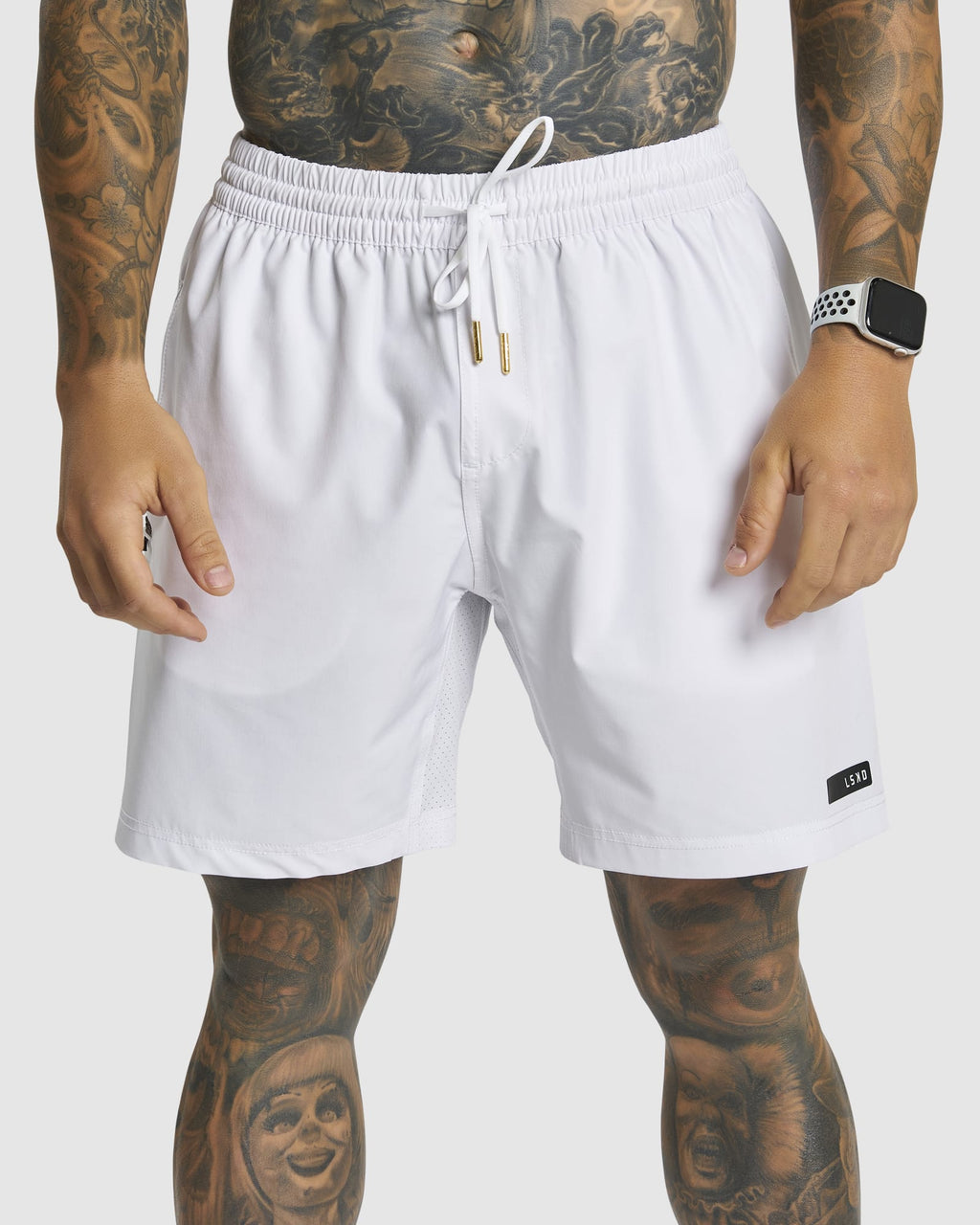 Model wearing LSKD x LM Rep 7" Performance Shorts - White
