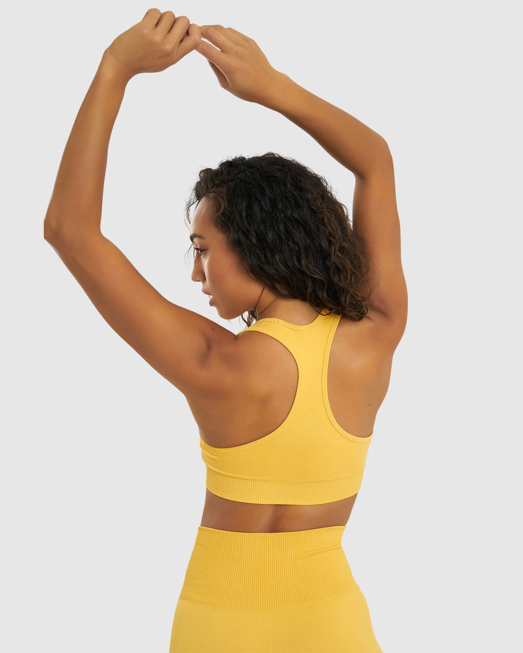 Model wearing Limitless Seamless Sports Bra - Sunny