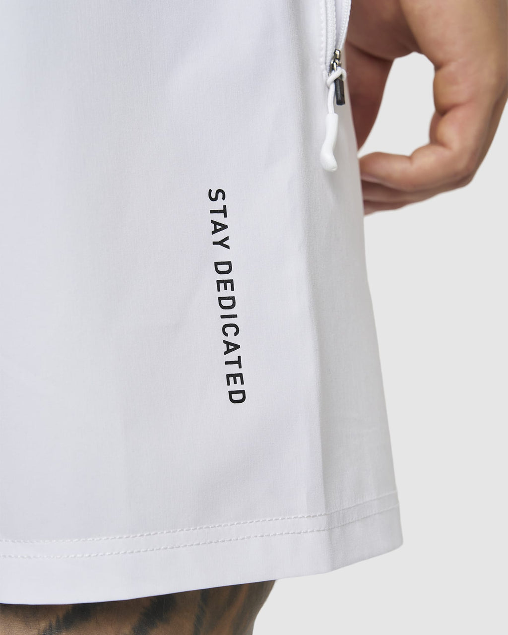 Model wearing LSKD x LM Rep 7" Performance Shorts - White