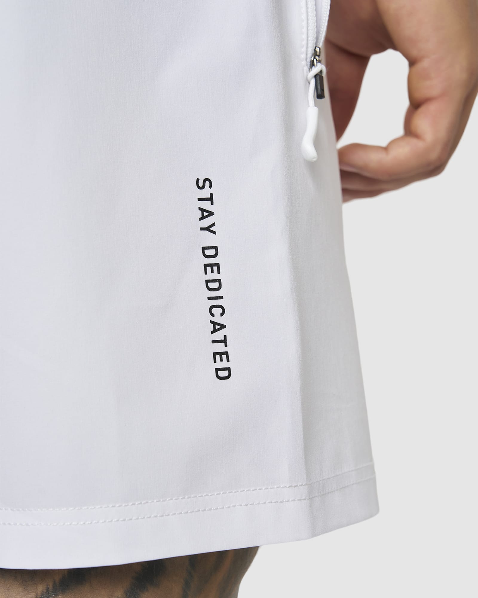 Model wearing LSKD x LM Rep 7" Performance Shorts - White